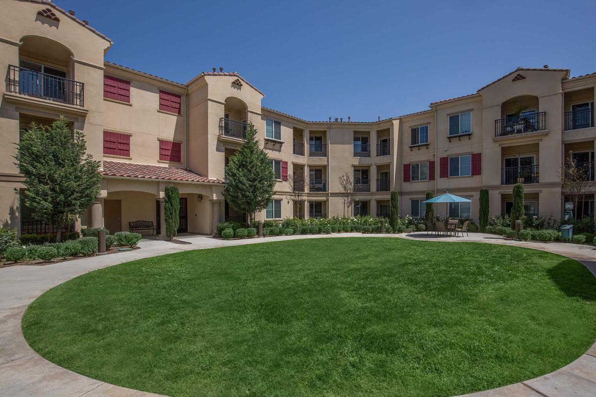 a large lawn in front of a building