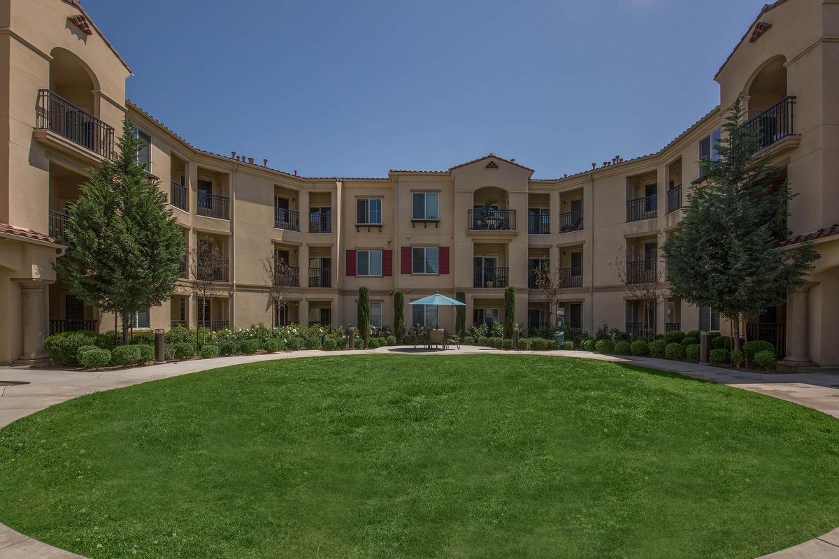 a large lawn in front of a building