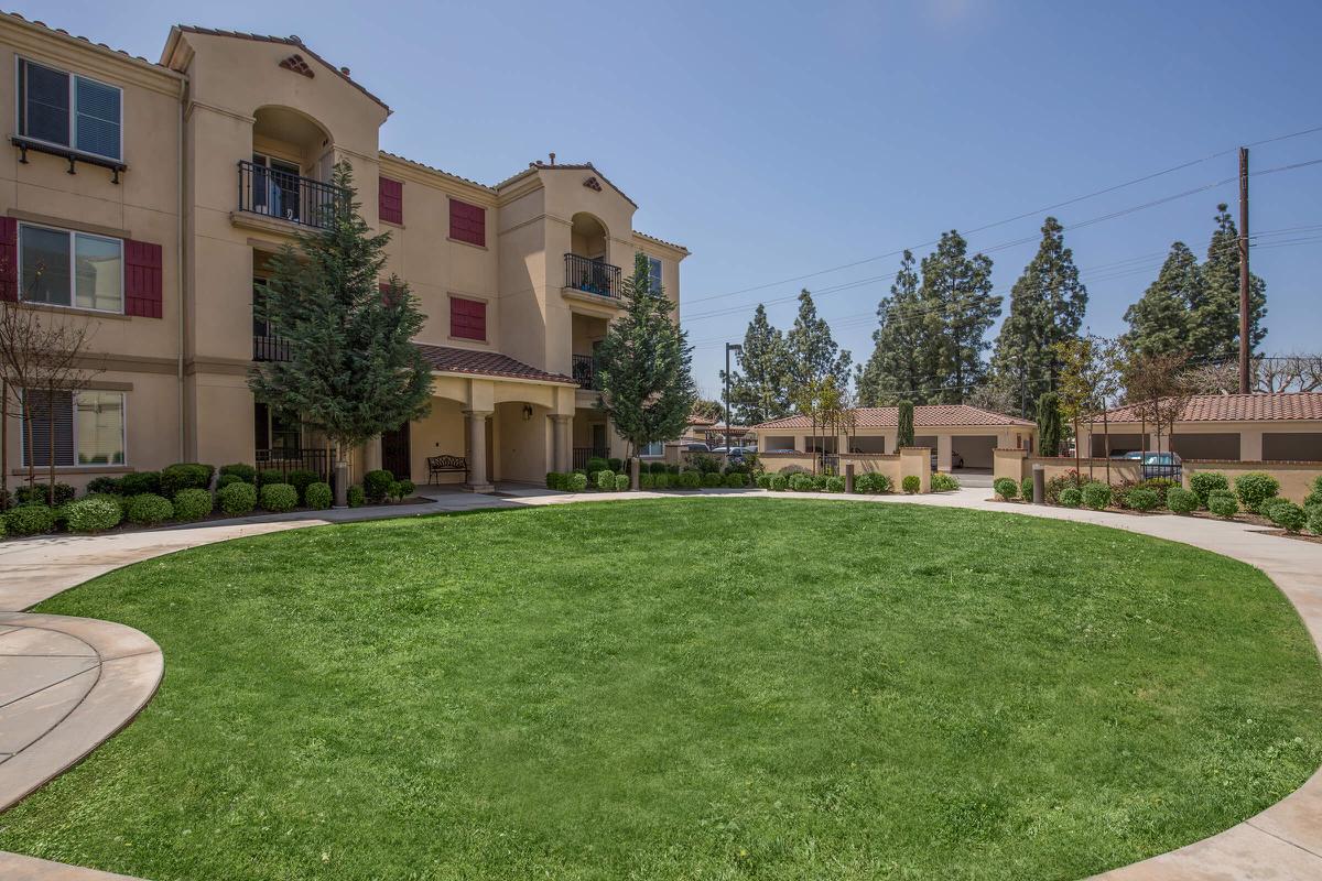 a large lawn in front of a building