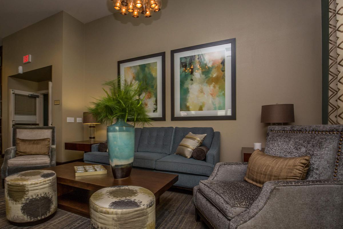 a living room filled with furniture and a fireplace