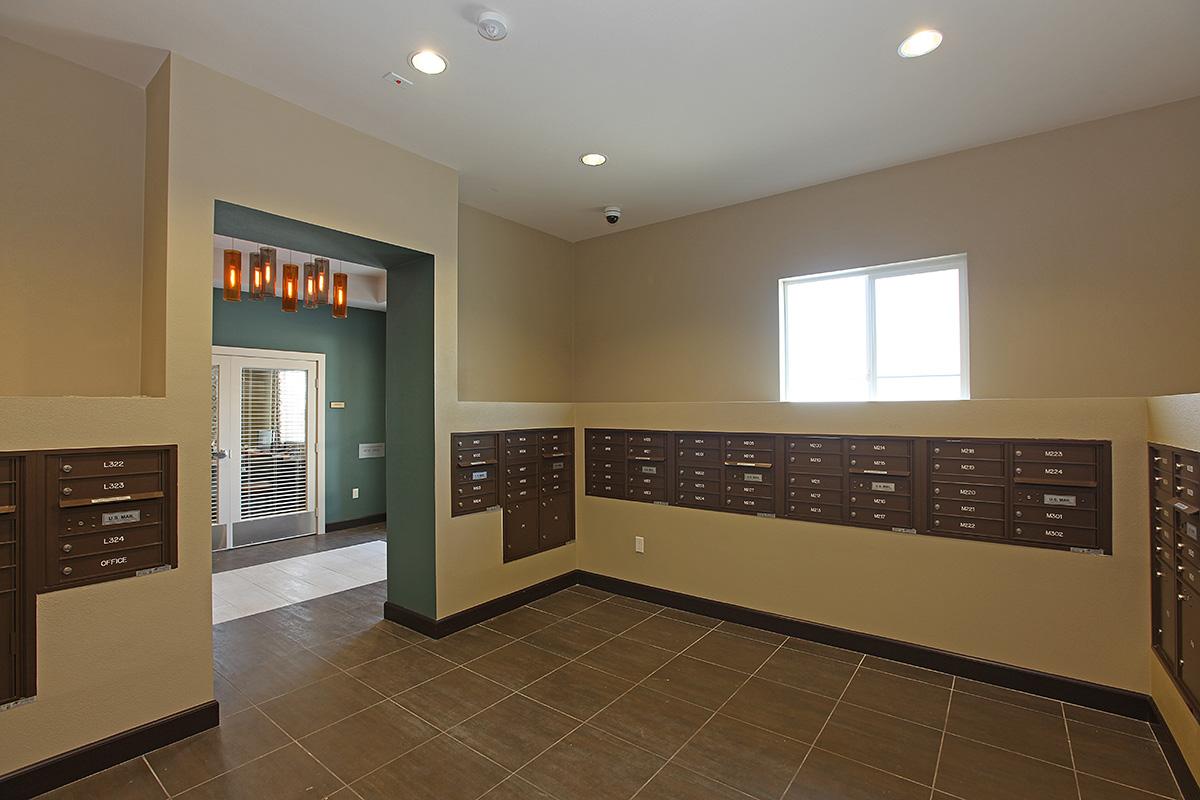 a large kitchen with stainless steel appliances