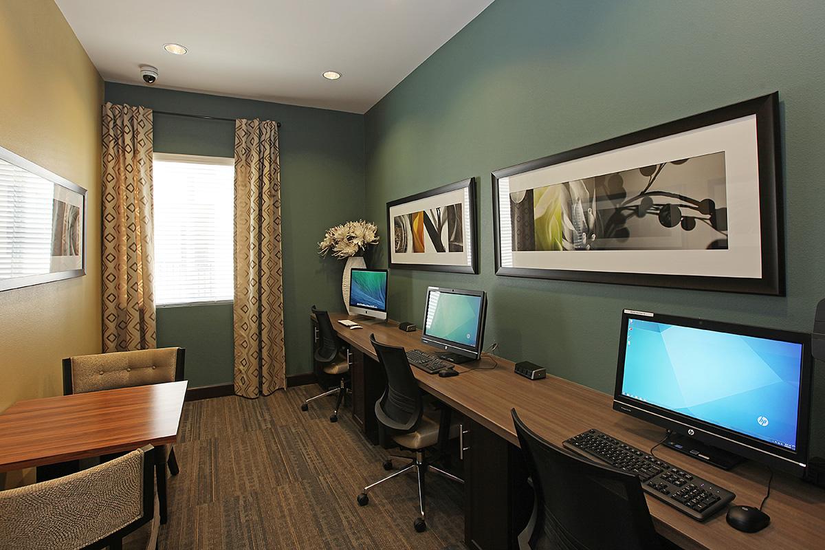 a room filled with furniture and a flat screen tv