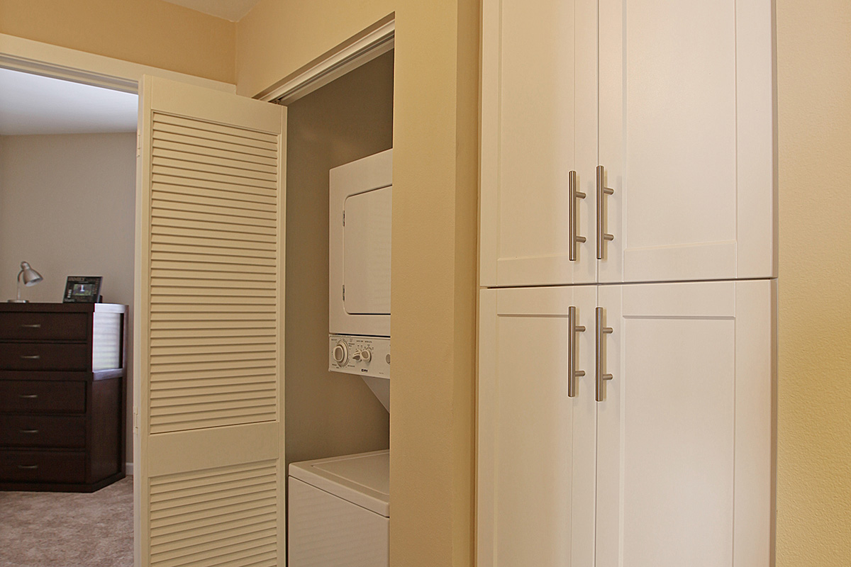 a white refrigerator freezer sitting in a room