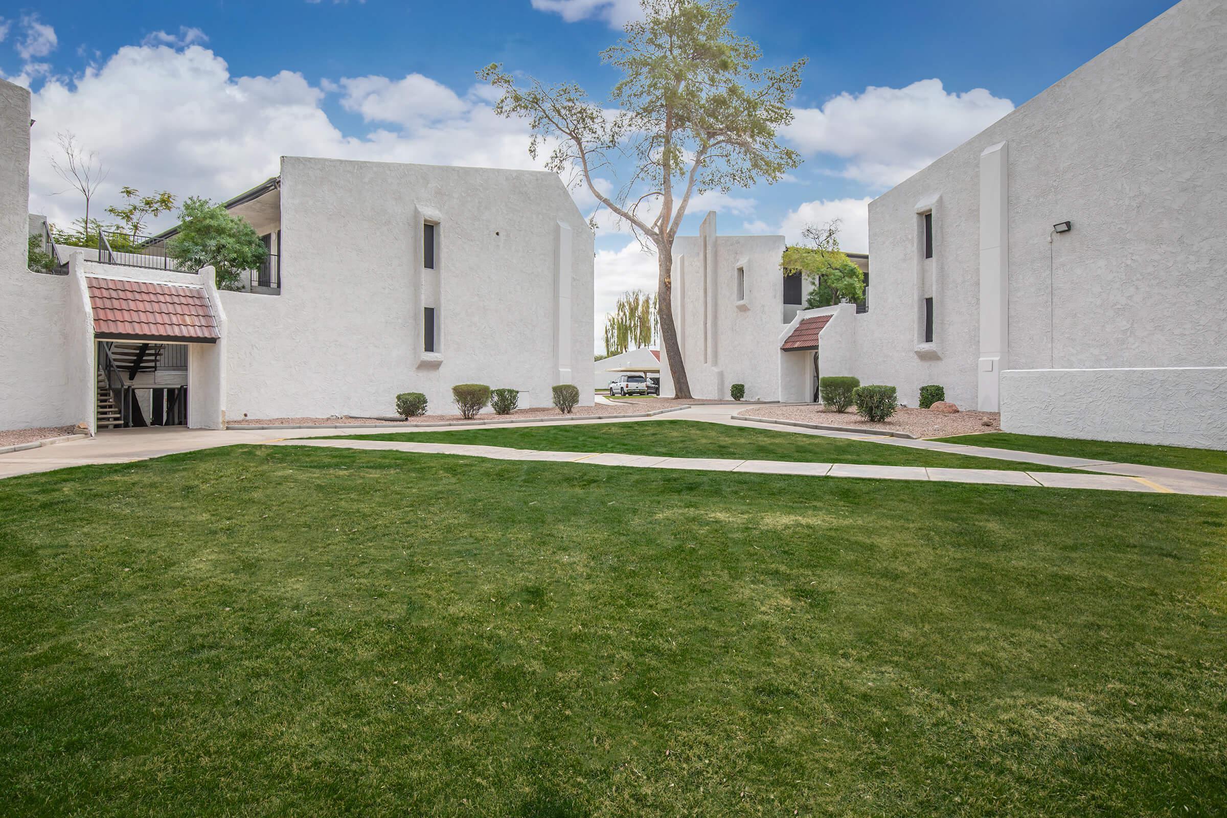 a large lawn in front of a house