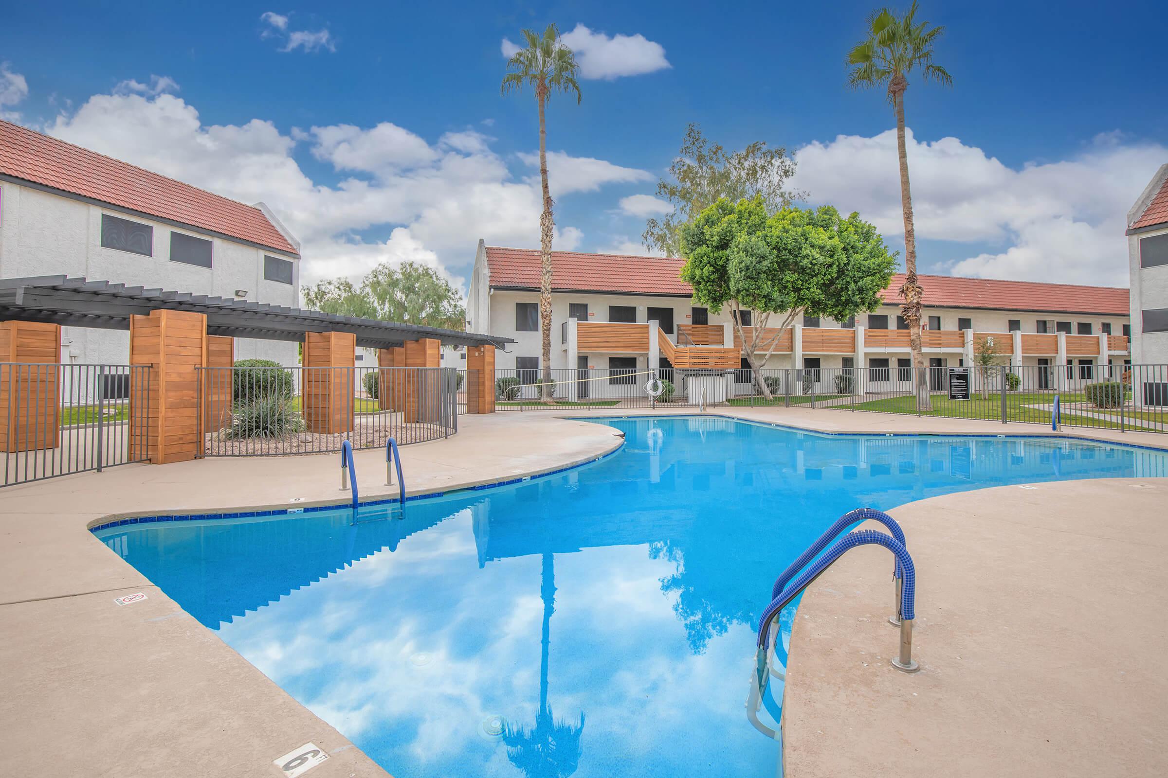 a pool in front of a building