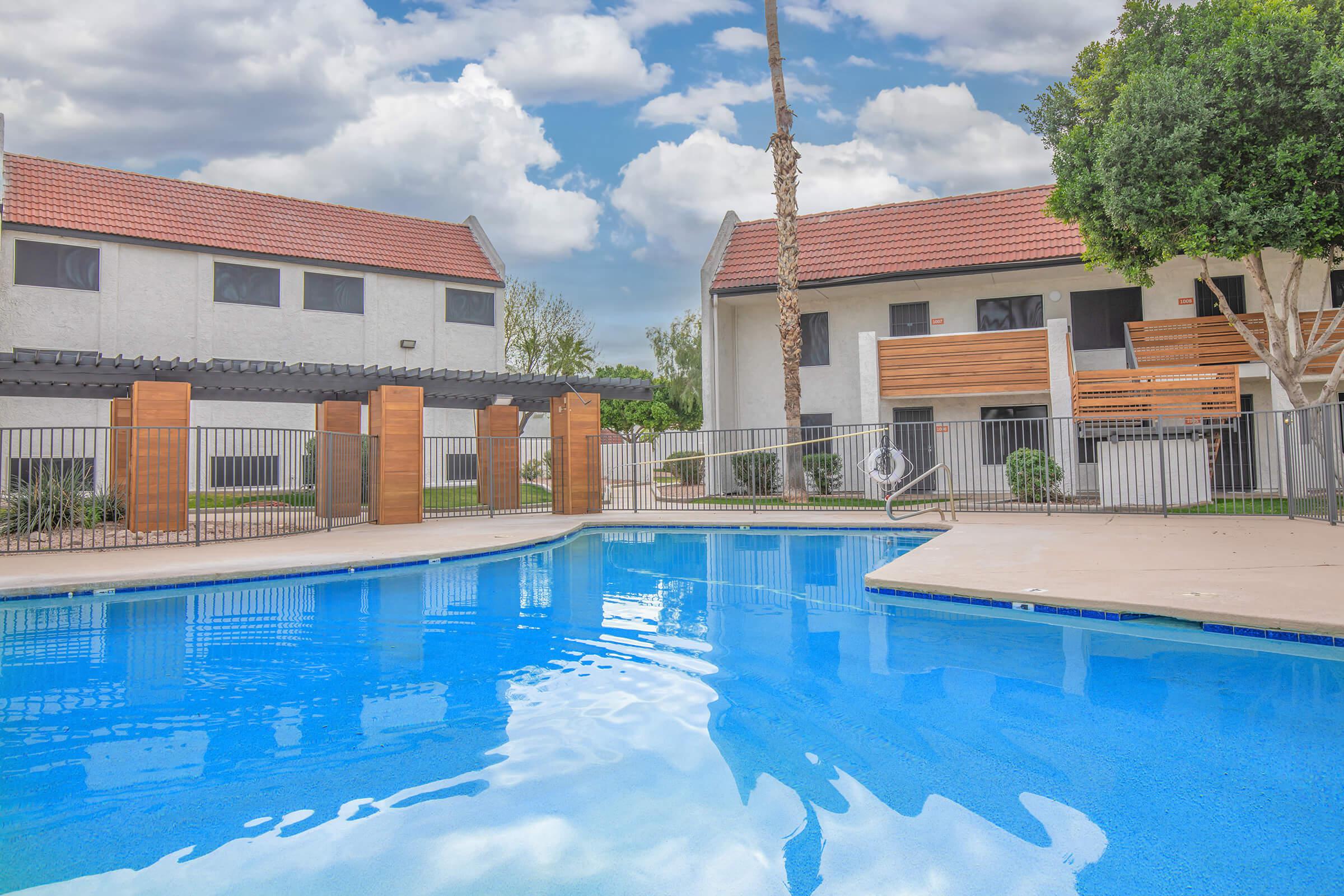 a large pool of water in front of a building