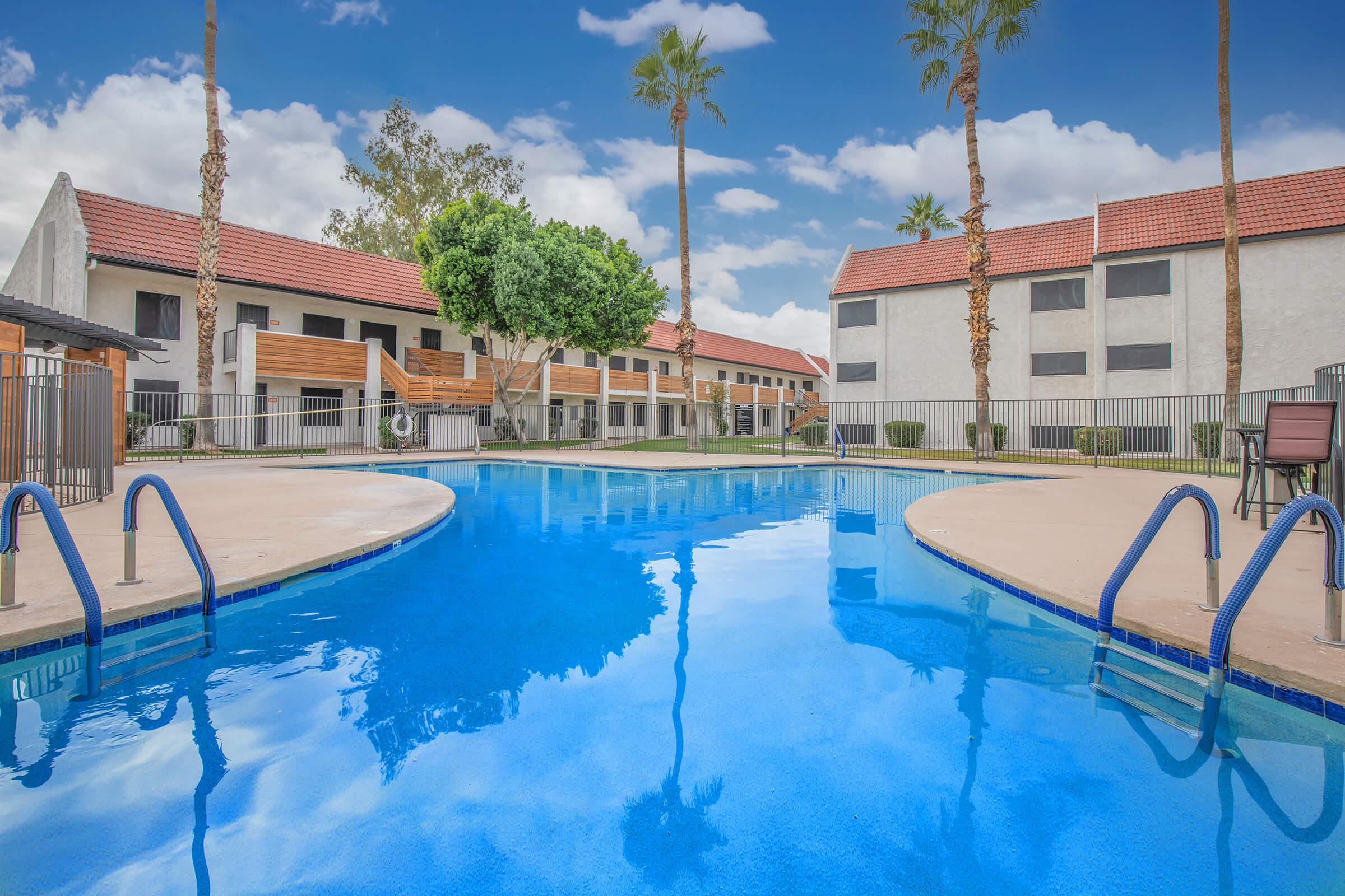 a house with a large pool of water