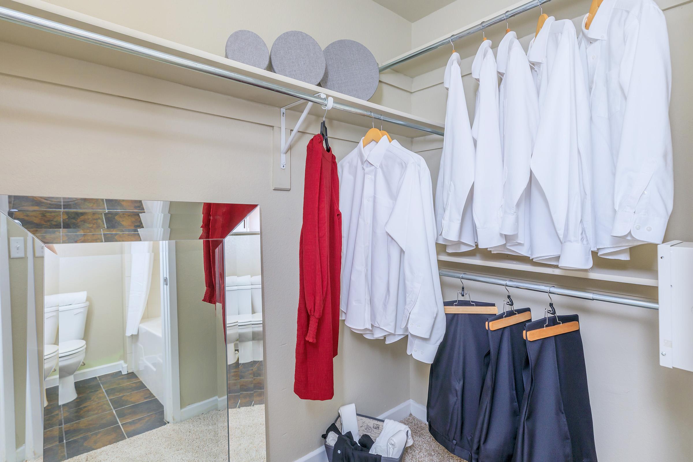 a bedroom with a towel hanging on the wall