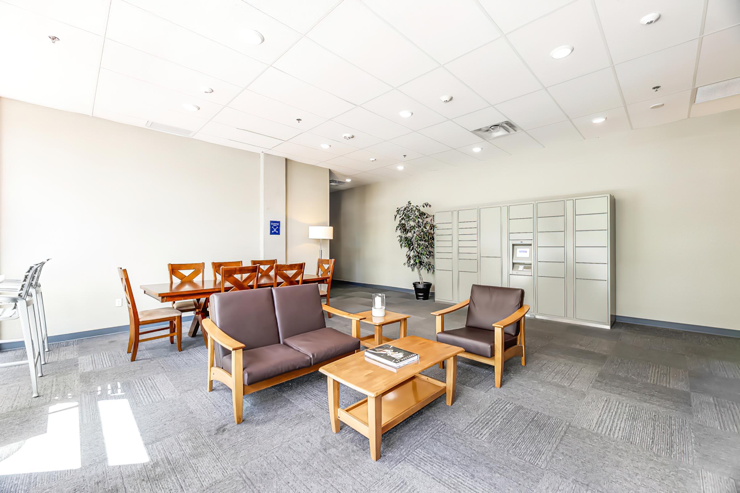 a living room filled with furniture and a table