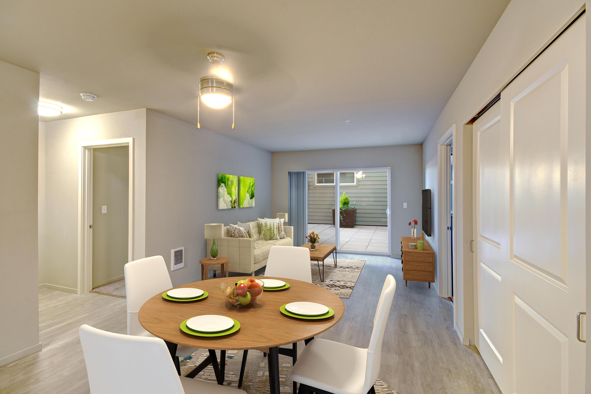 a kitchen with a table in a room