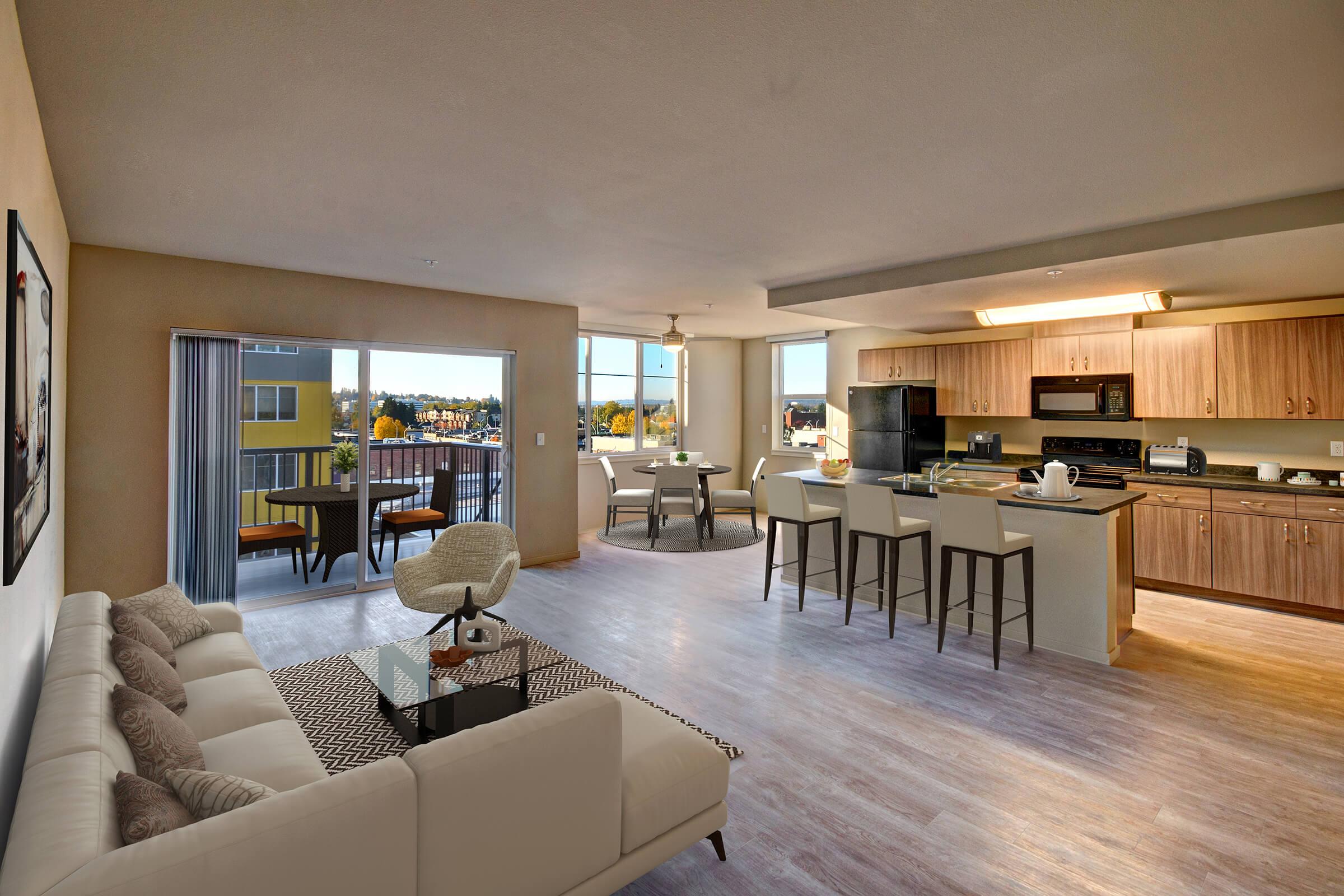 a living room filled with furniture and a large window