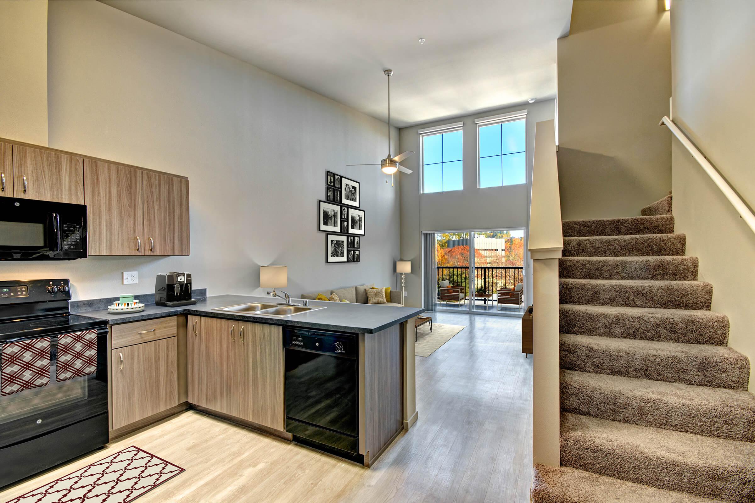 a modern kitchen with stainless steel appliances