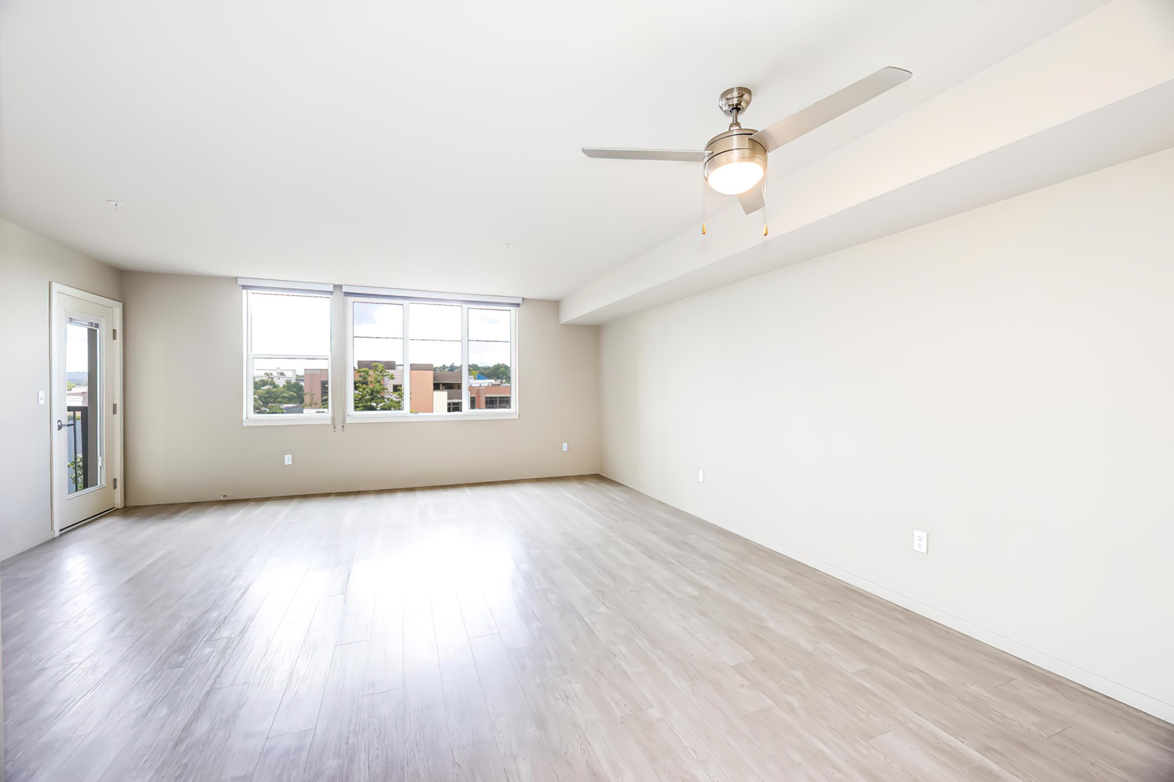 a bedroom with a bed and a mirror