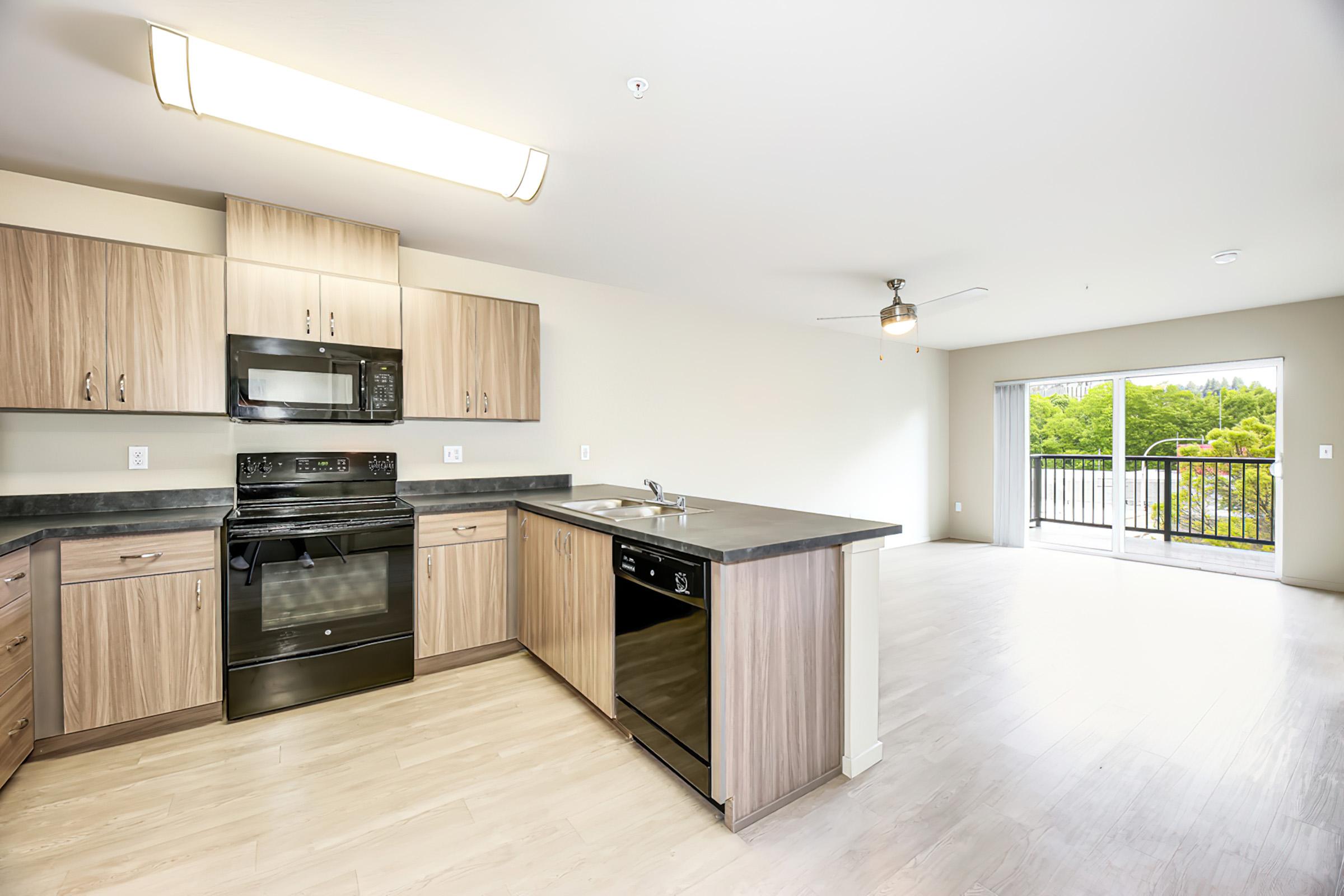 a kitchen with a wood floor