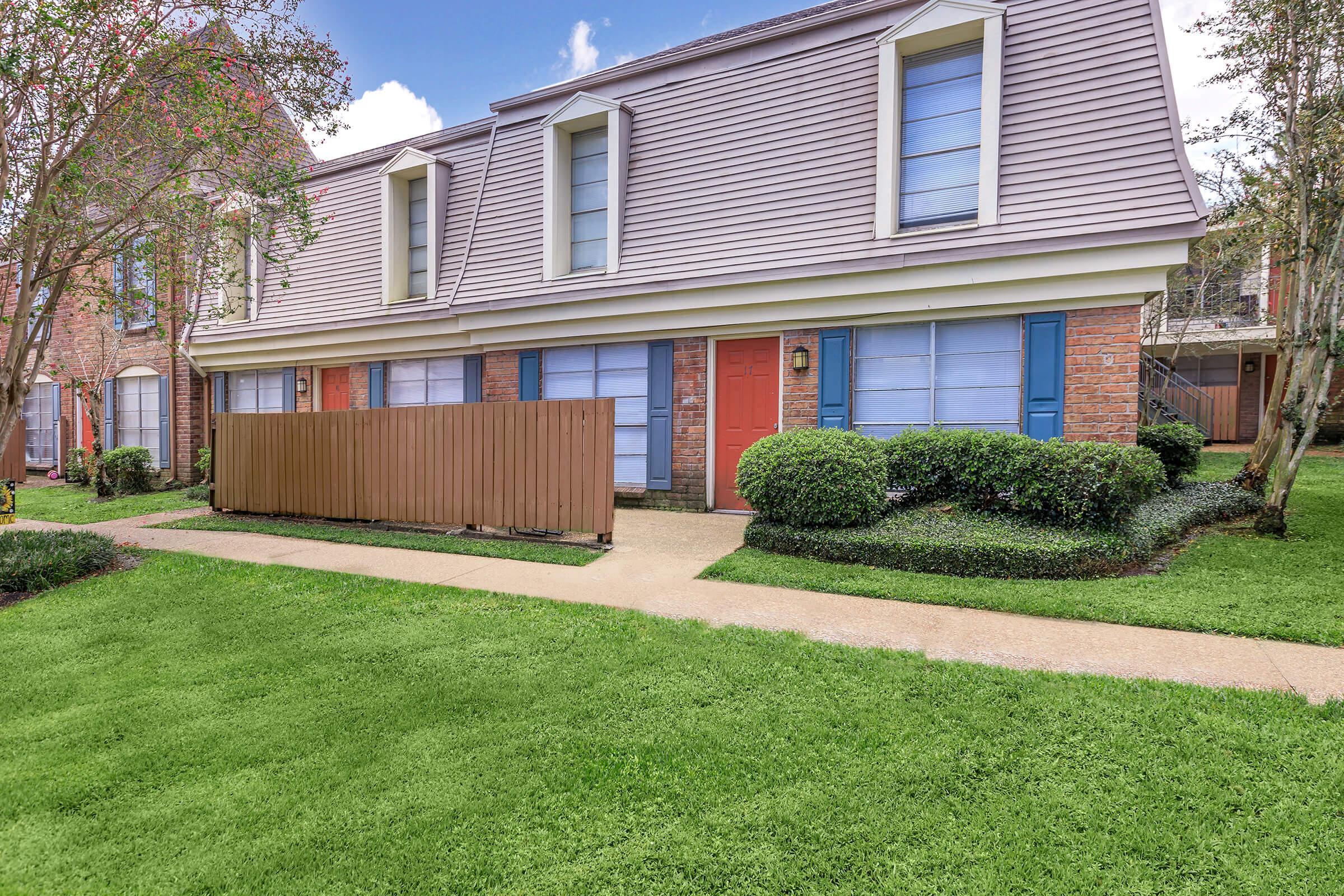 a large lawn in front of a house