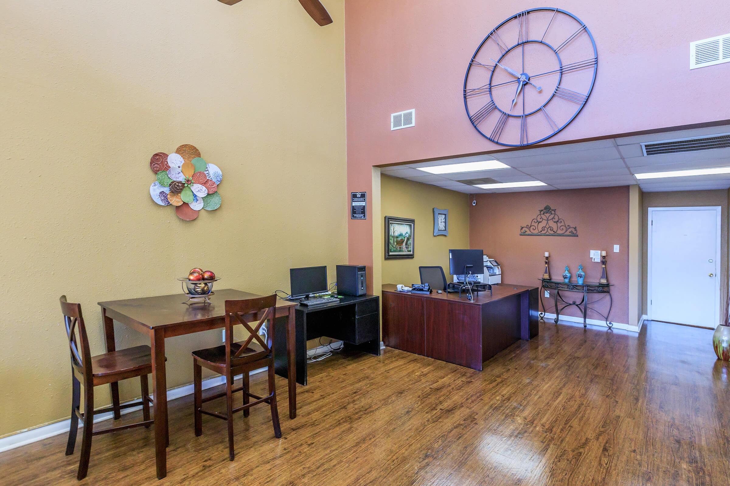 a room filled with furniture and a table