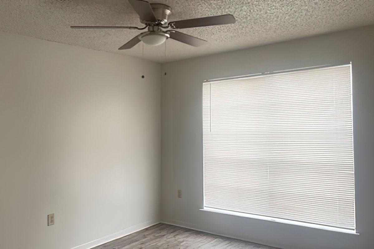 a room with a sink and a window