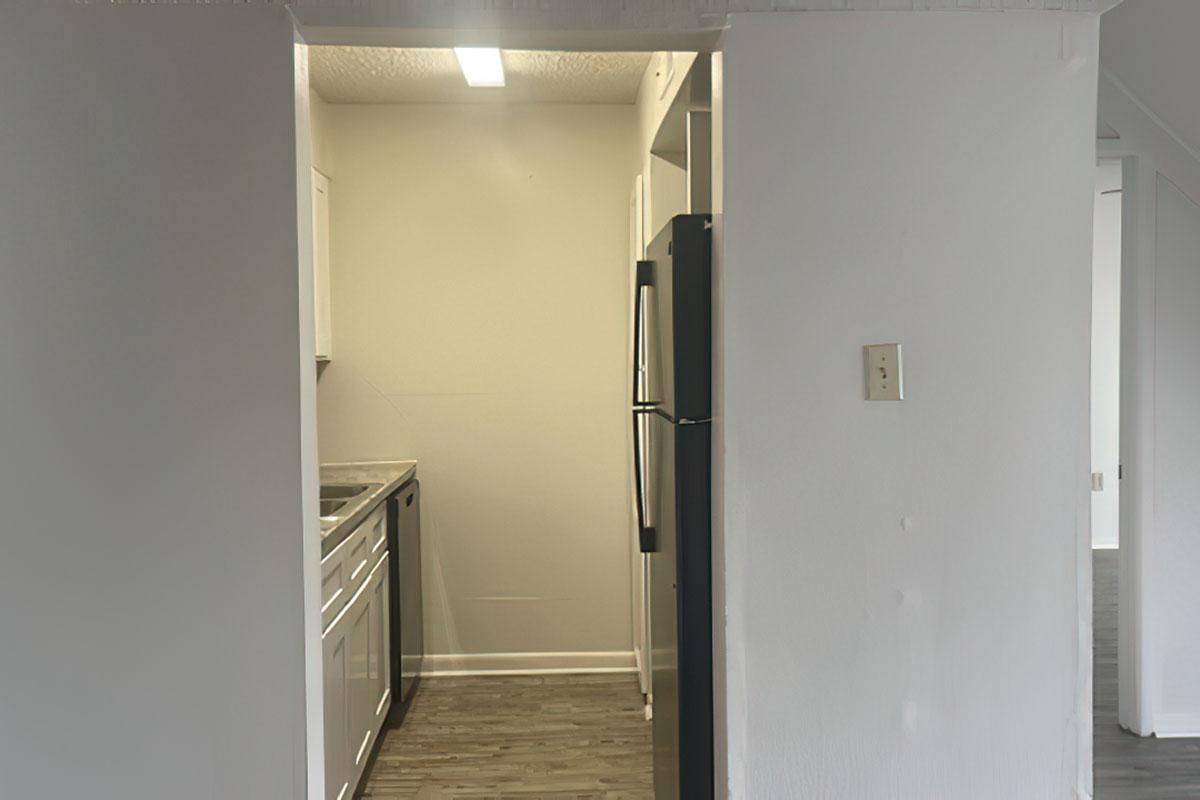 a stainless steel refrigerator in a room