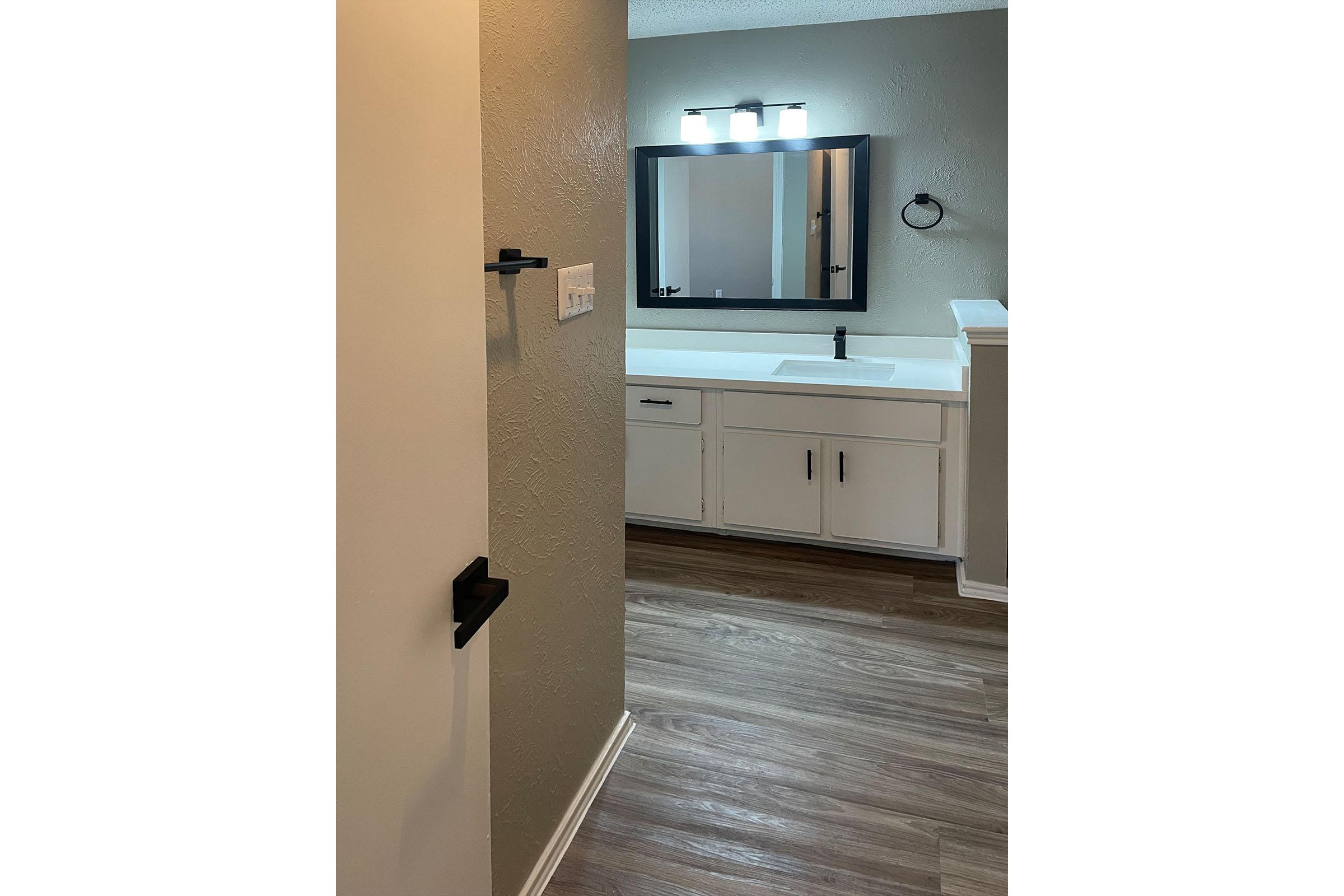 a refrigerator freezer sitting in a room