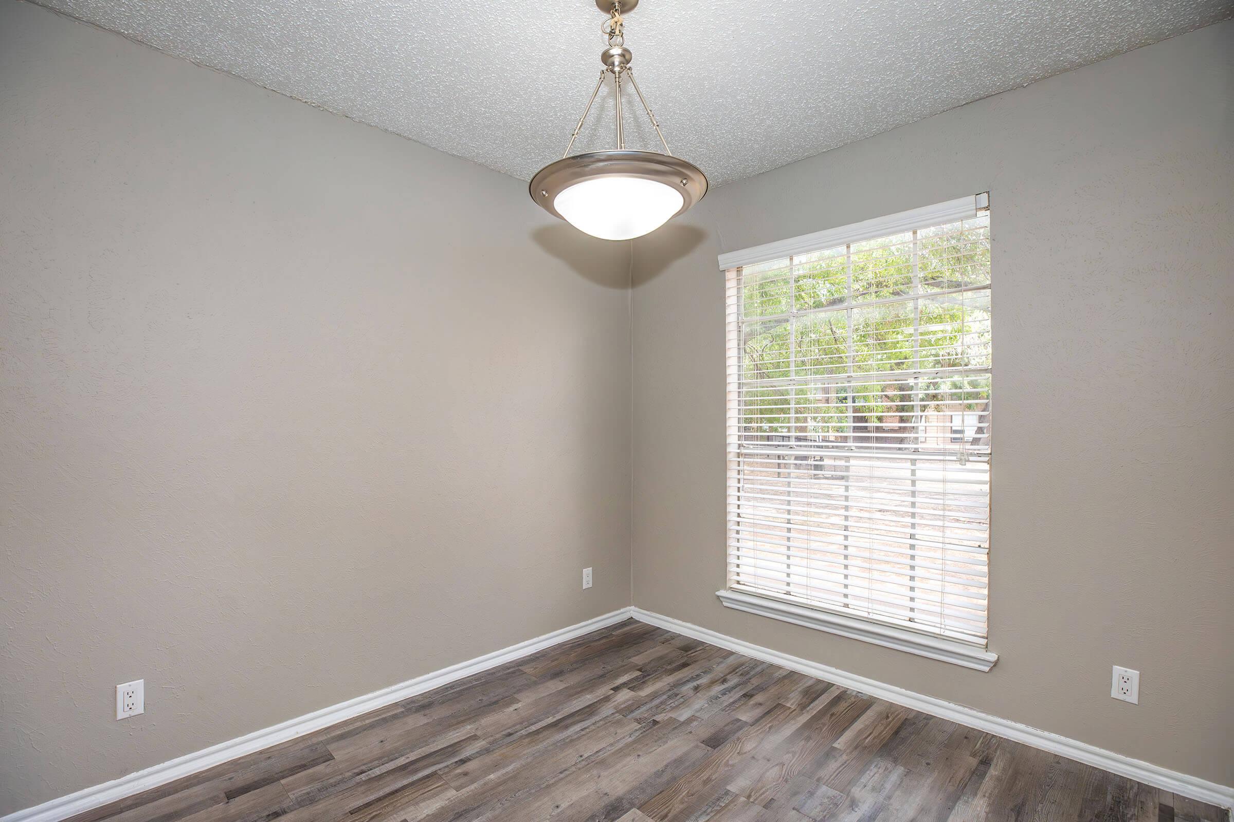 a room with a sink and a window