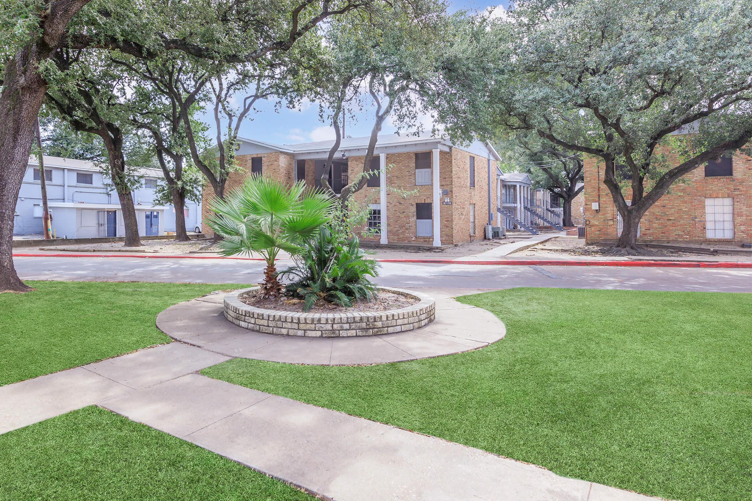 a large lawn in front of a building