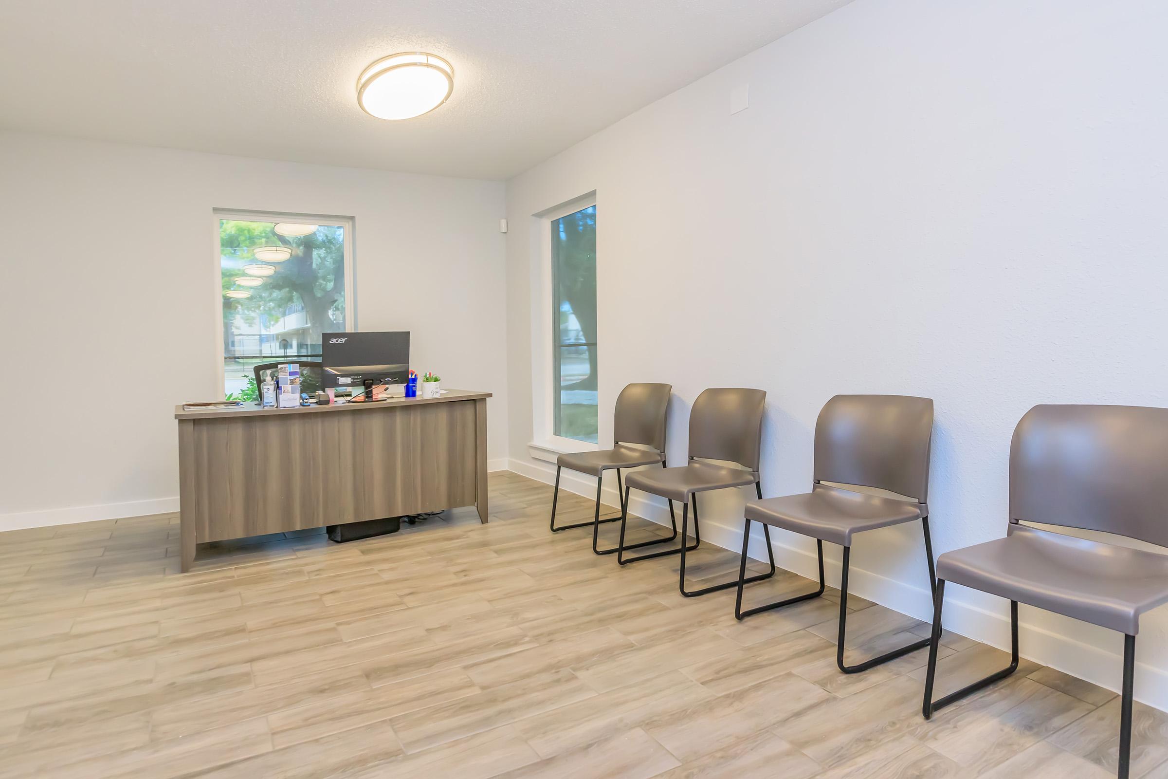 a room with a desk and chair