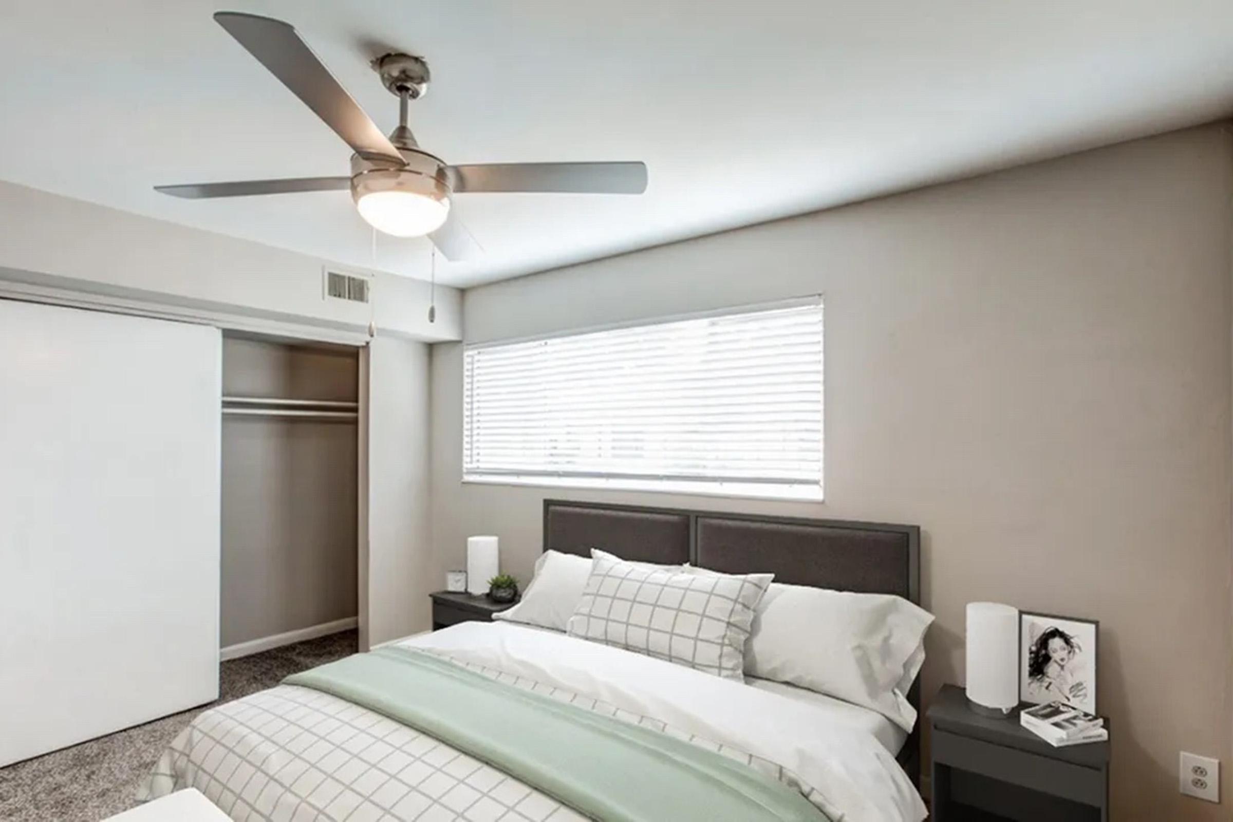 a bedroom with a bed in a hotel room