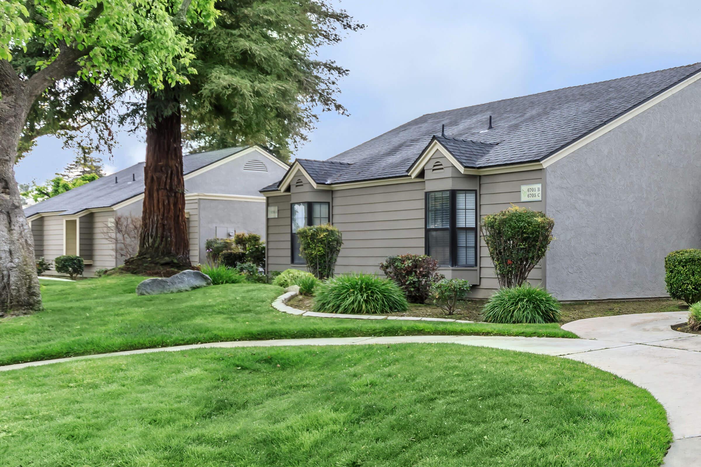 a large lawn in front of a house