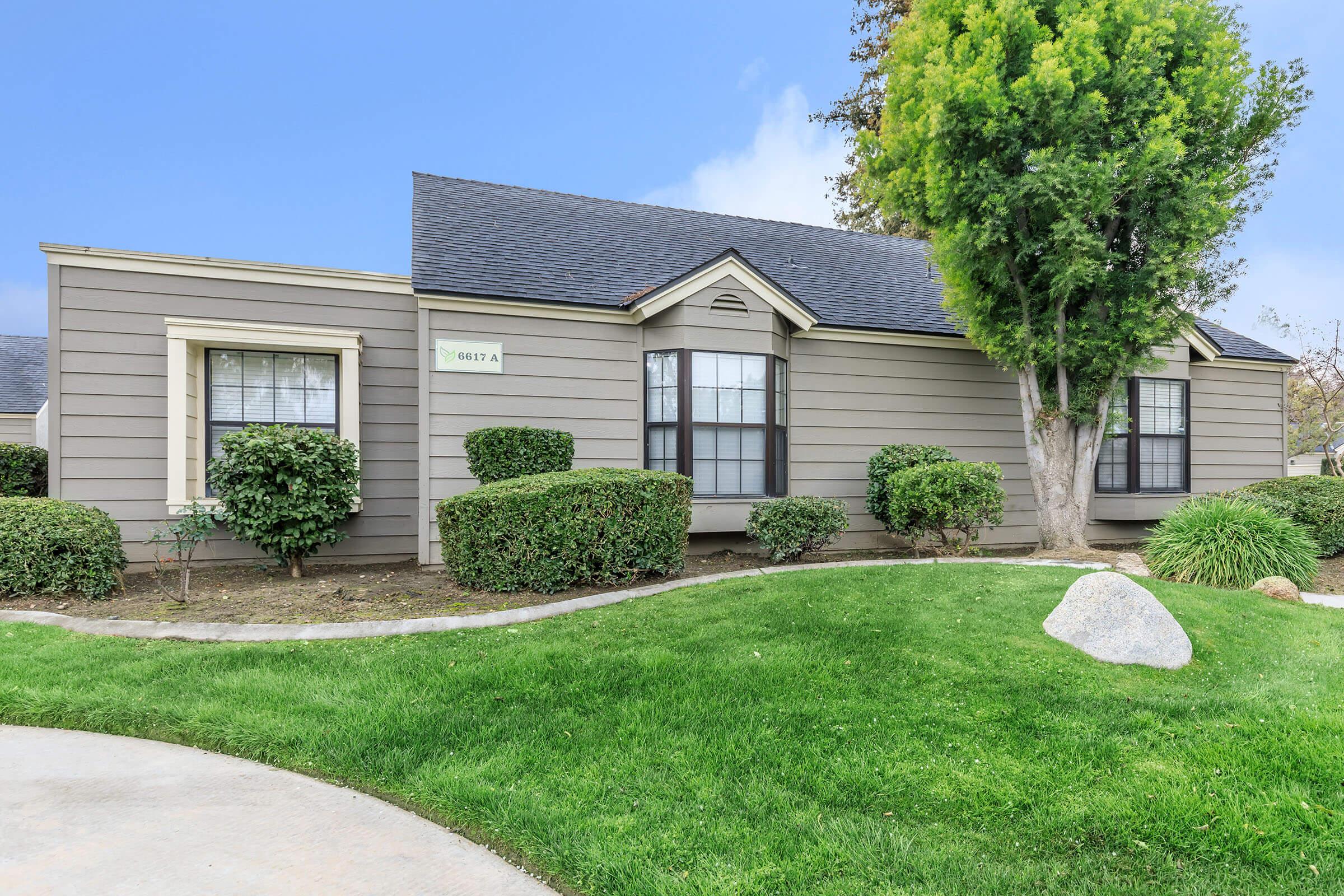 a large lawn in front of a house