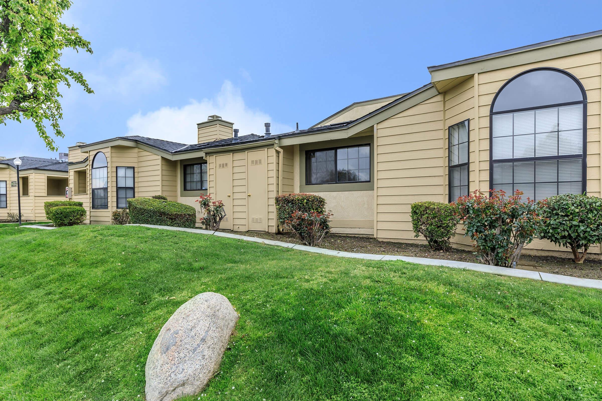 a large lawn in front of a house