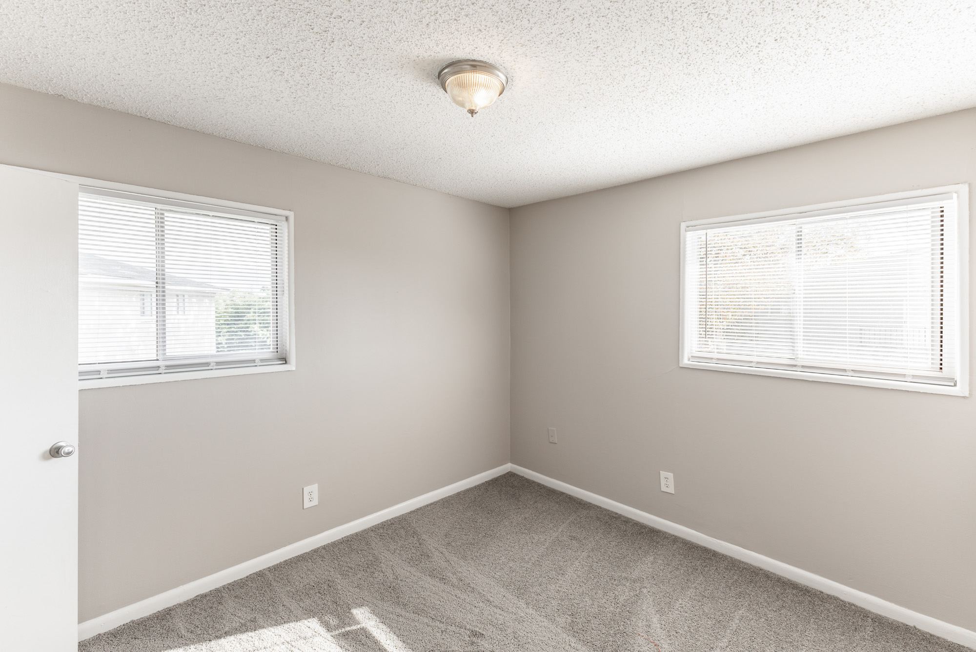 a room with a sink and a window