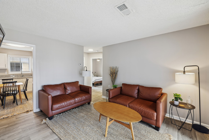 a living room with a wooden floor