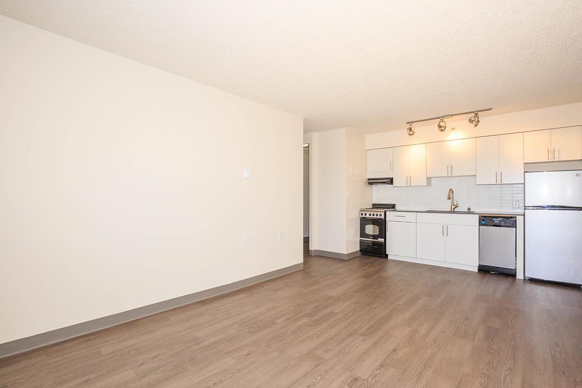 a kitchen with a wood floor