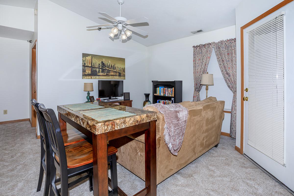 a living room with a wooden floor