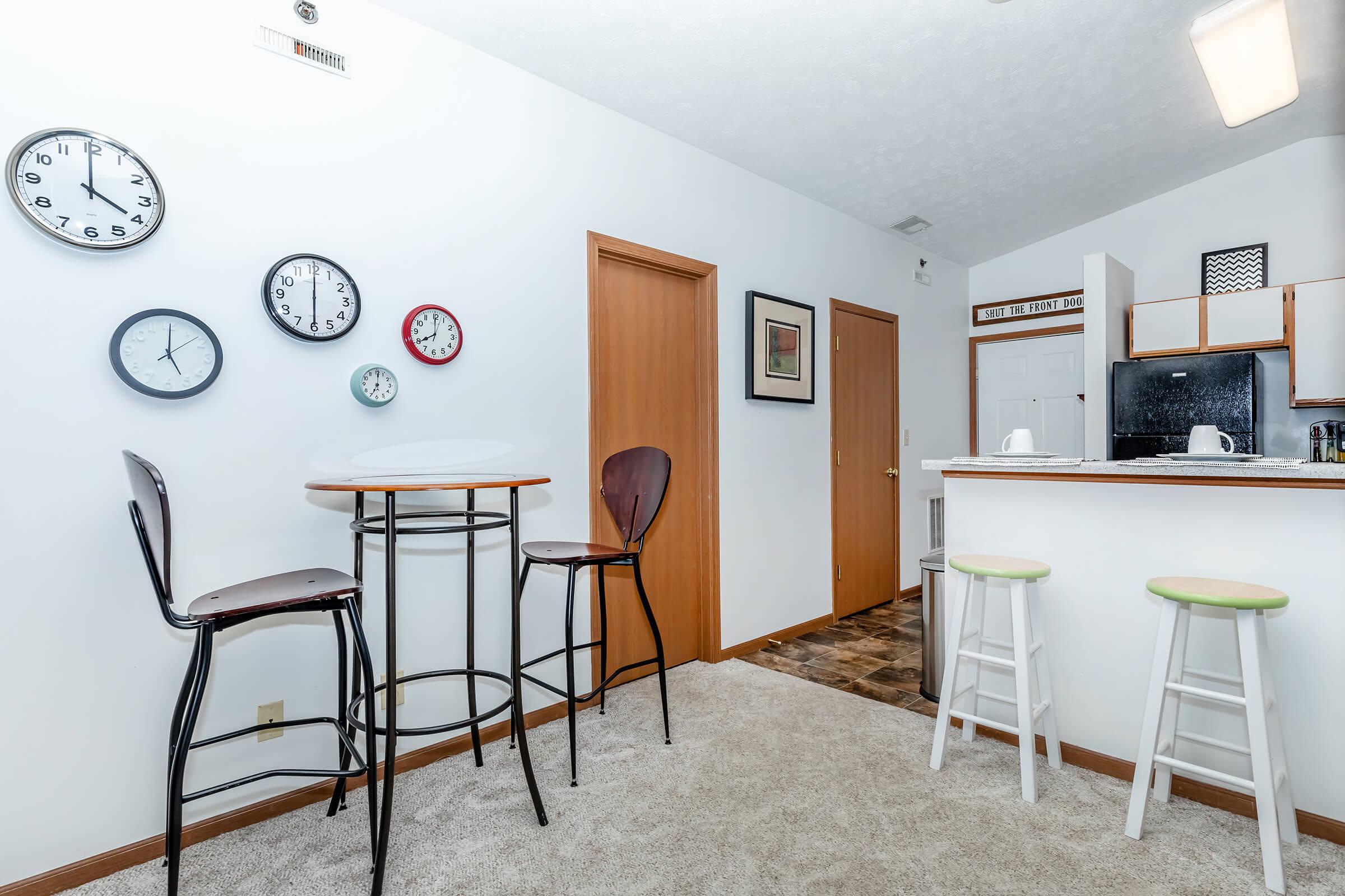 a room filled with furniture and a clock