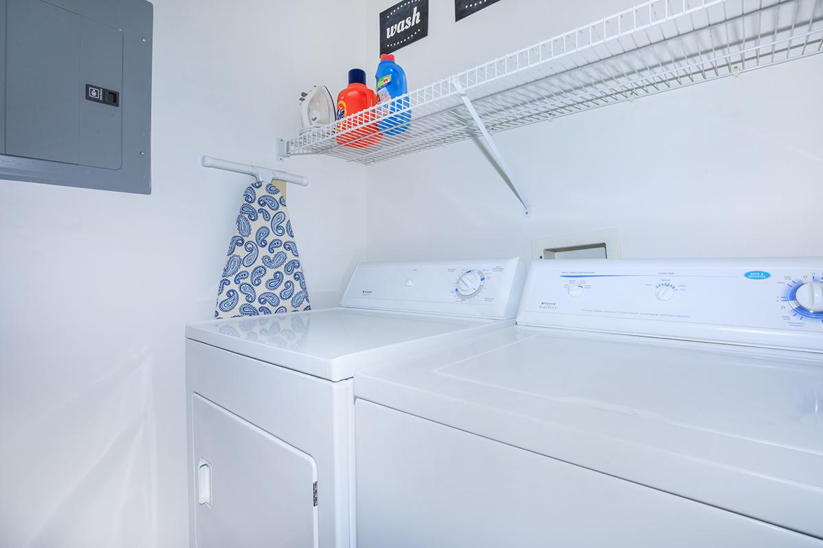 a white refrigerator freezer sitting in a room