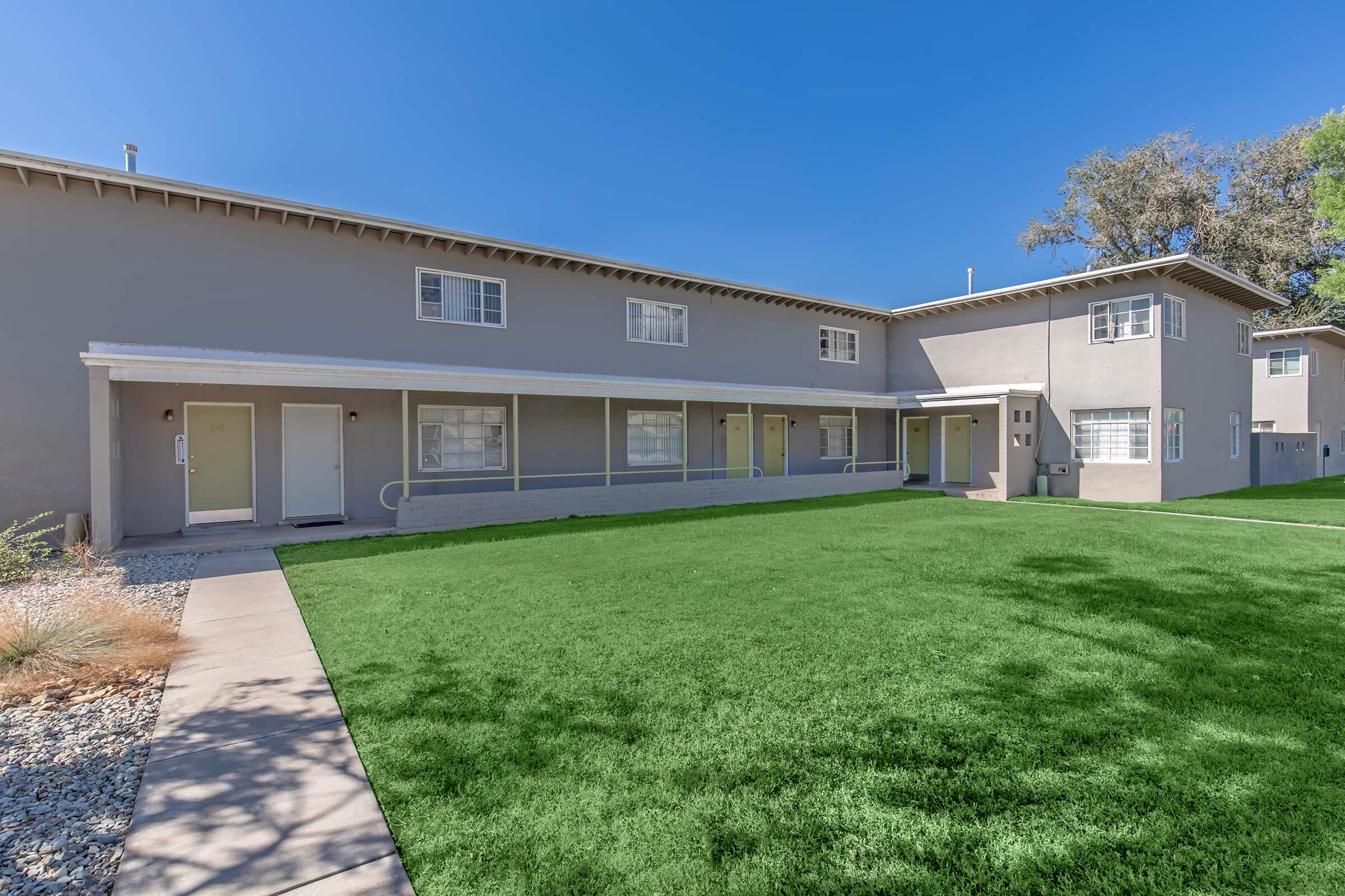 a large lawn in front of a house