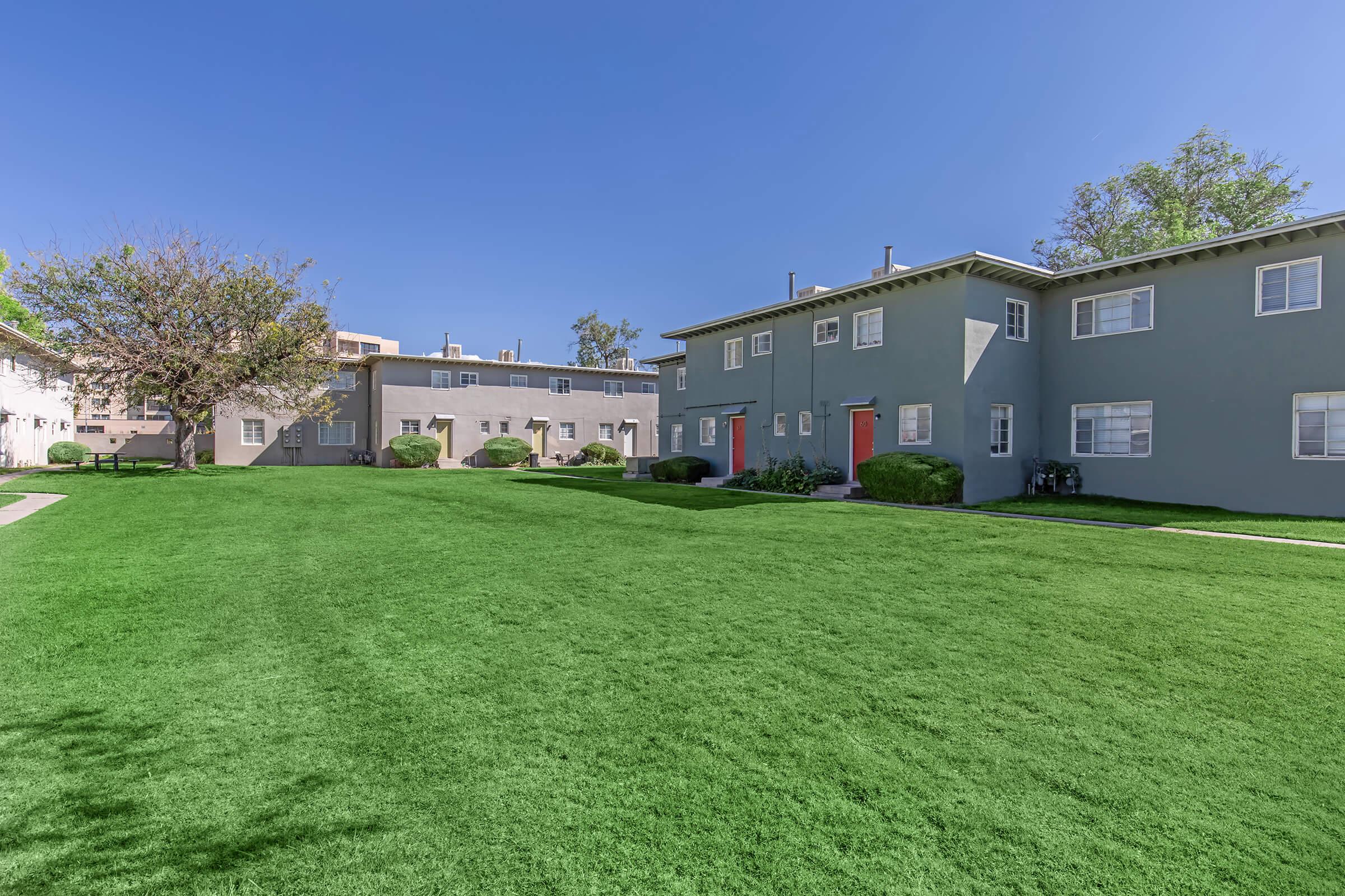 a large lawn in front of a house