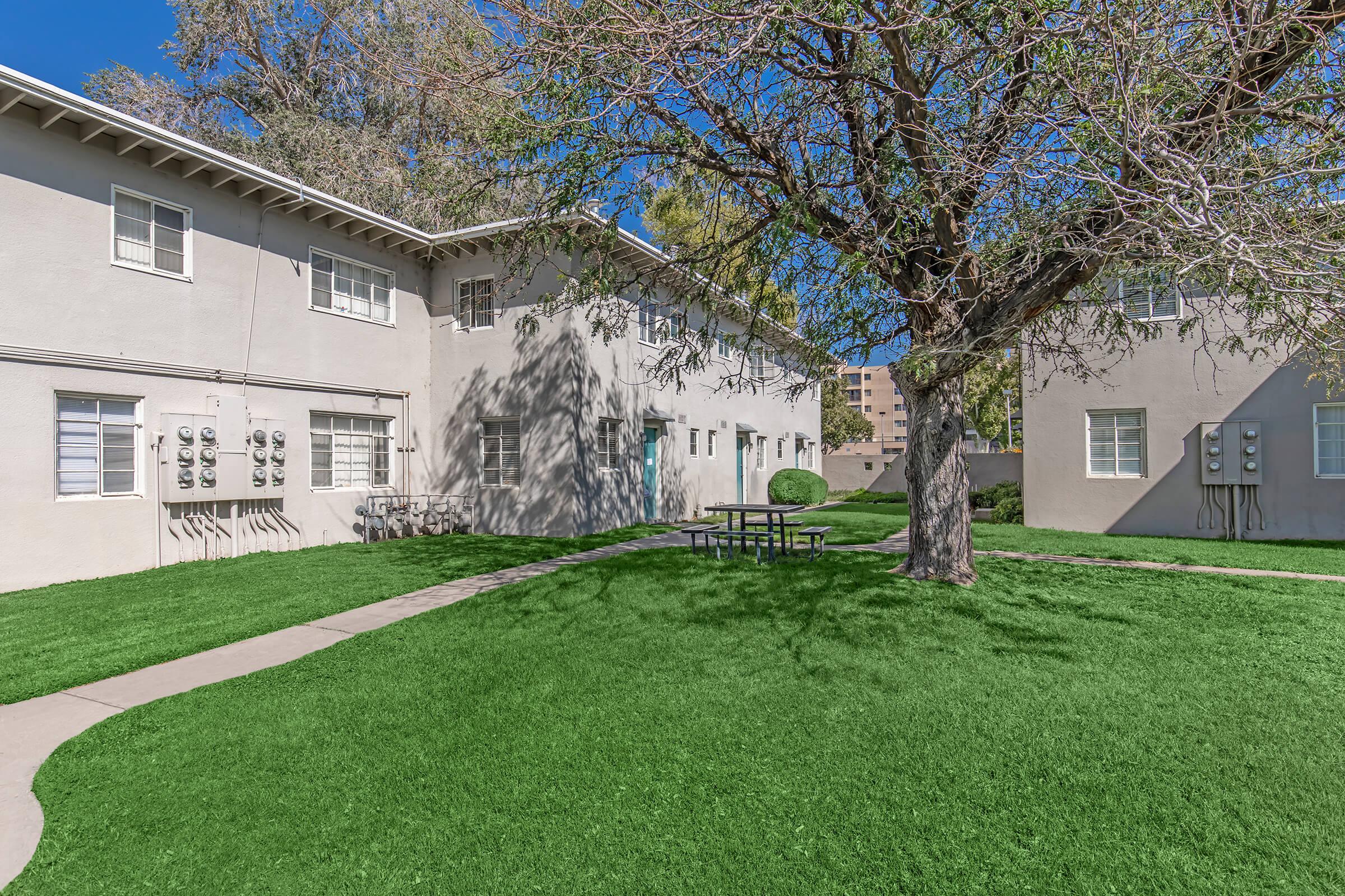 a large lawn in front of a house