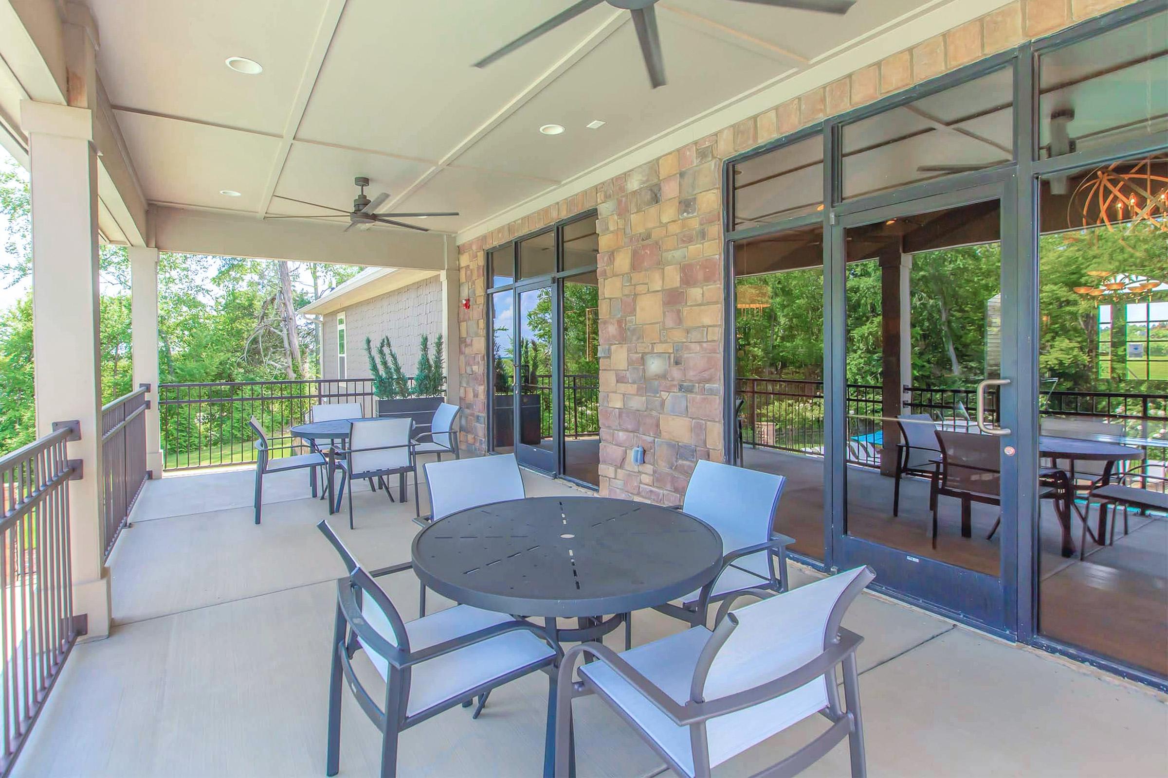 a dining room table in front of a building