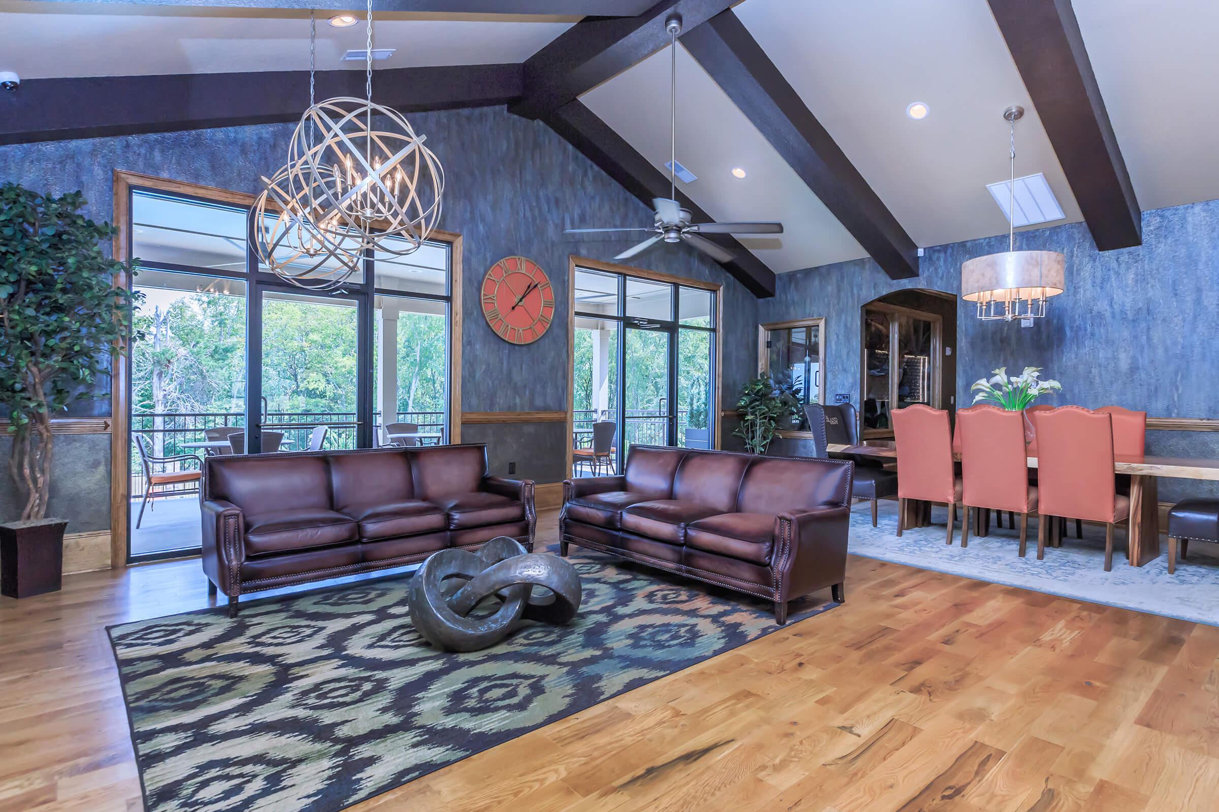 a living room filled with furniture and a fireplace