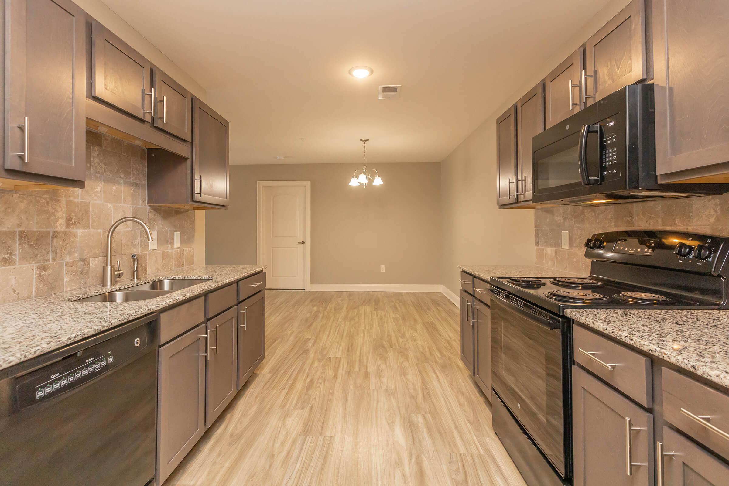 a modern kitchen with stainless steel appliances