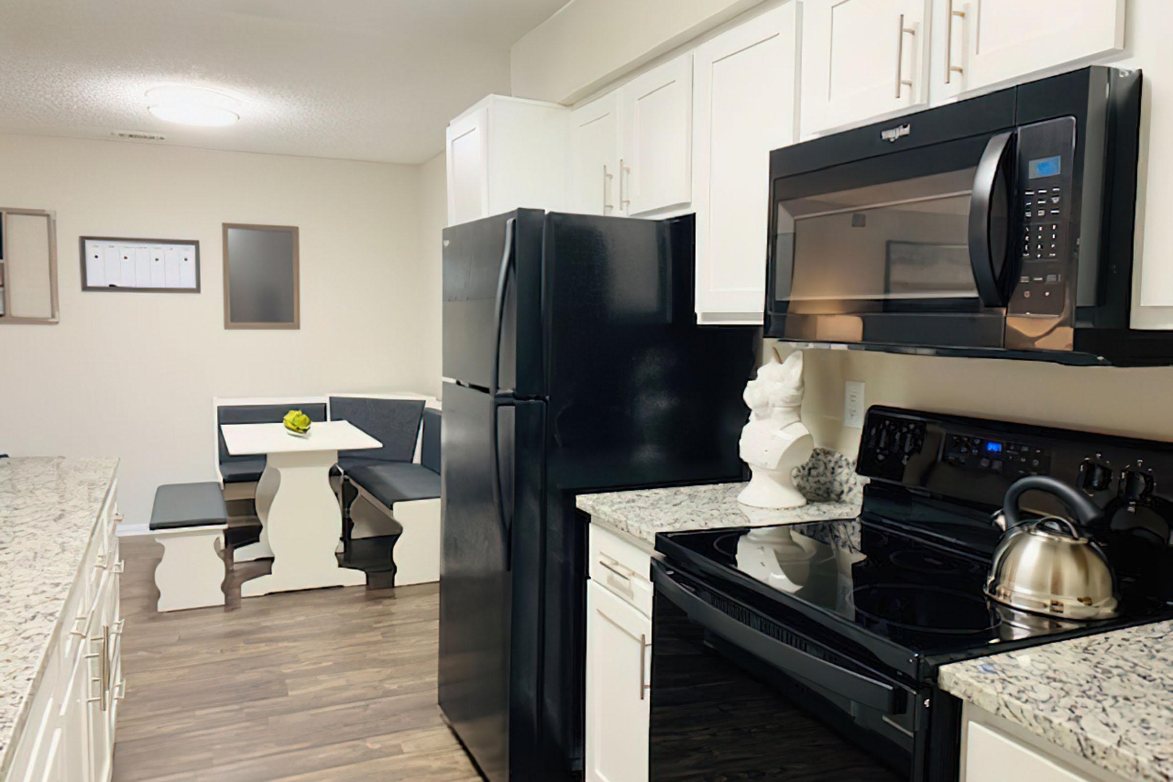 a modern kitchen with stainless steel appliances