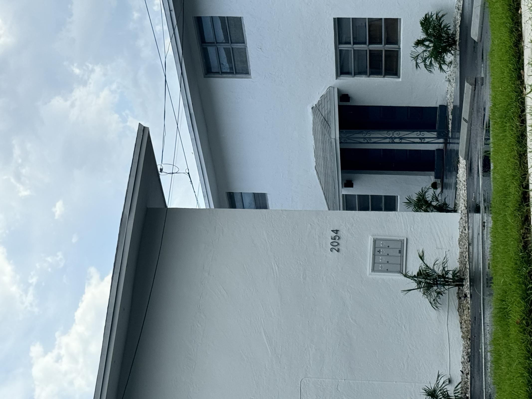 a house in front of a building