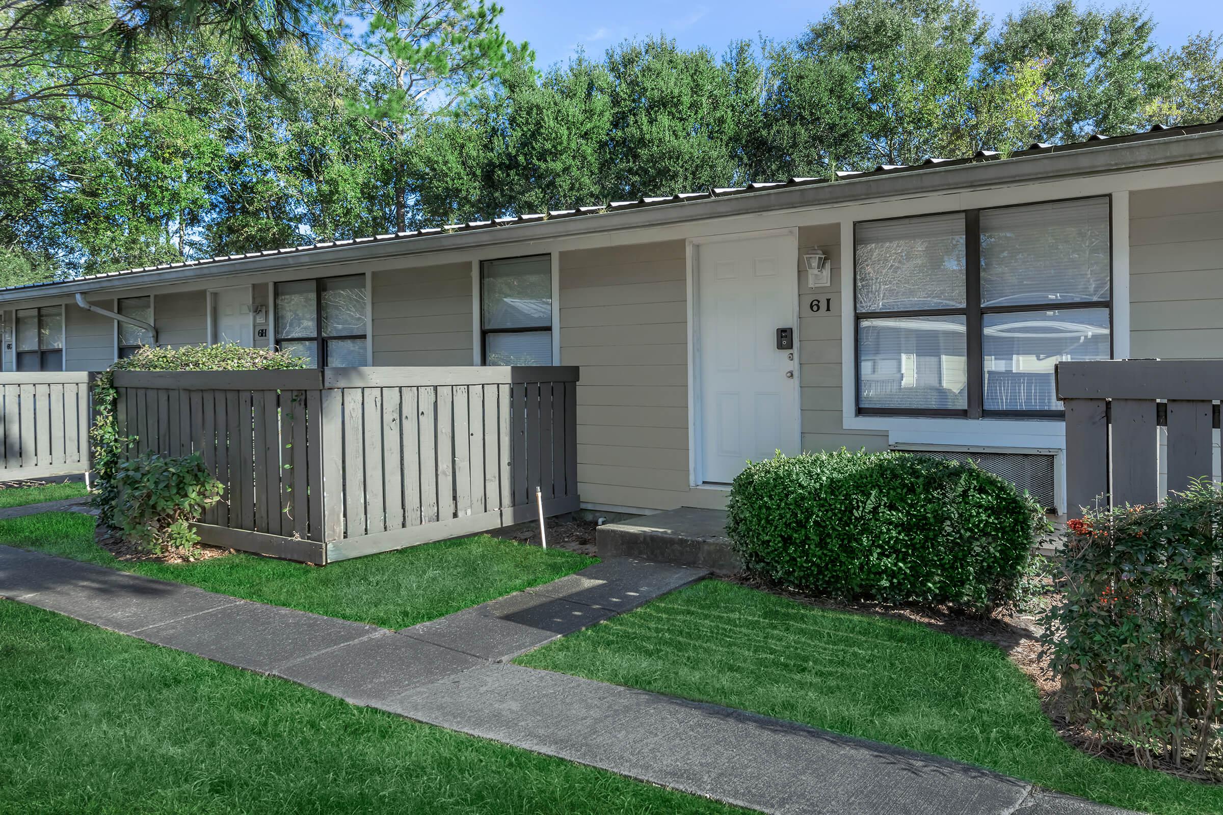 a large lawn in front of a house