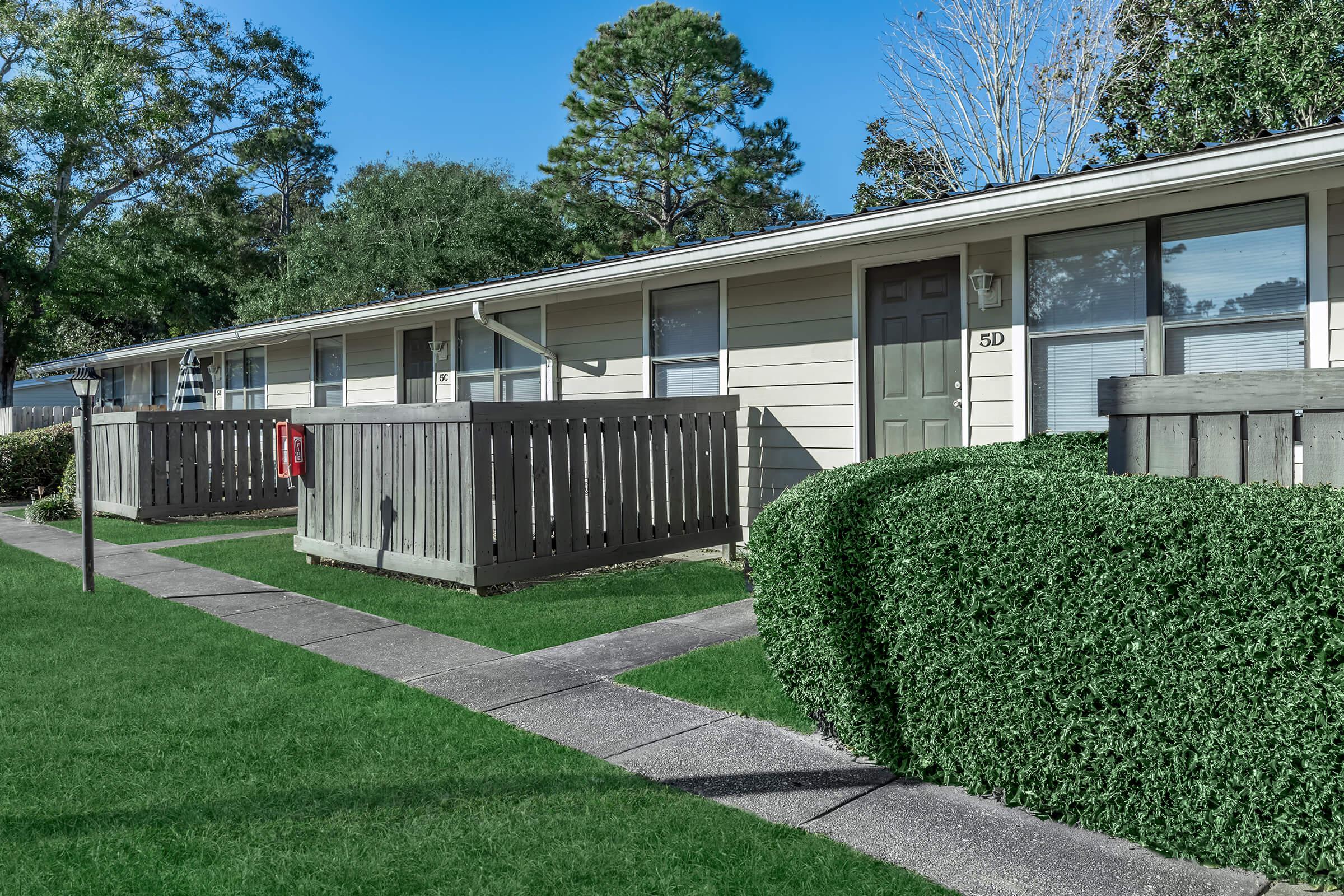 a large lawn in front of a house