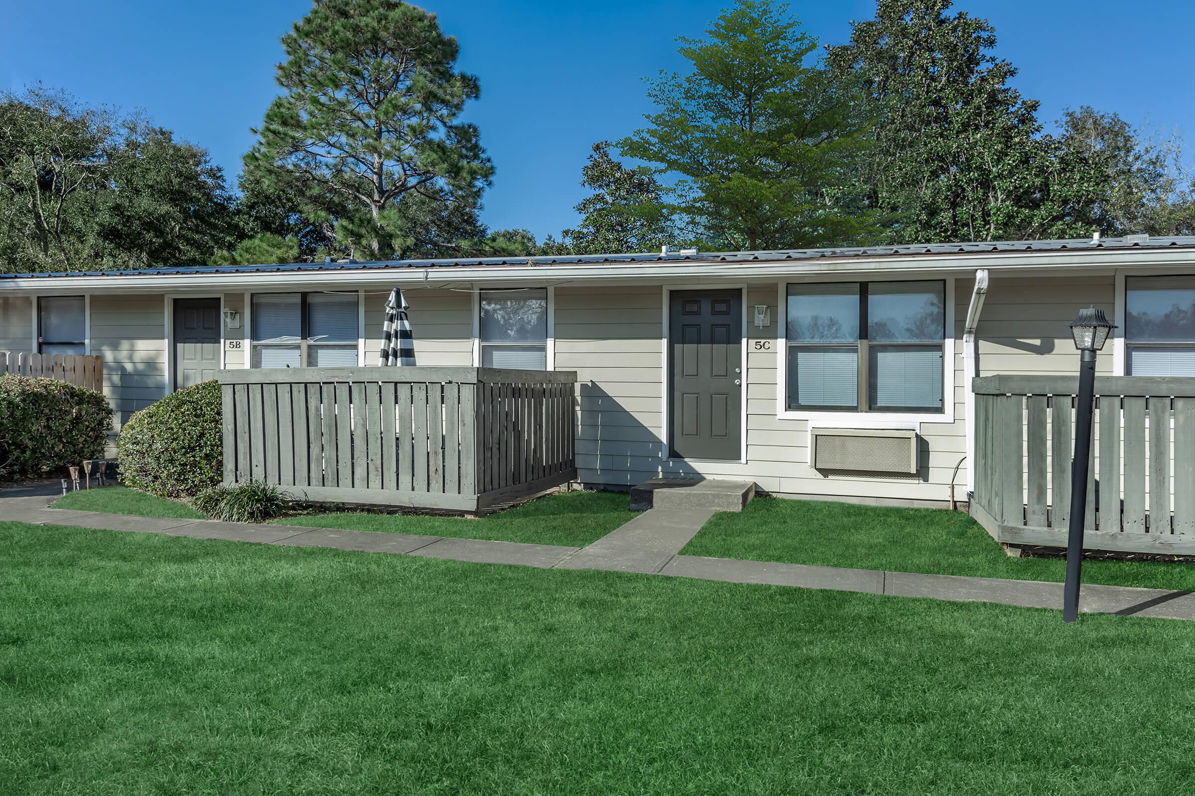 a large lawn in front of a house