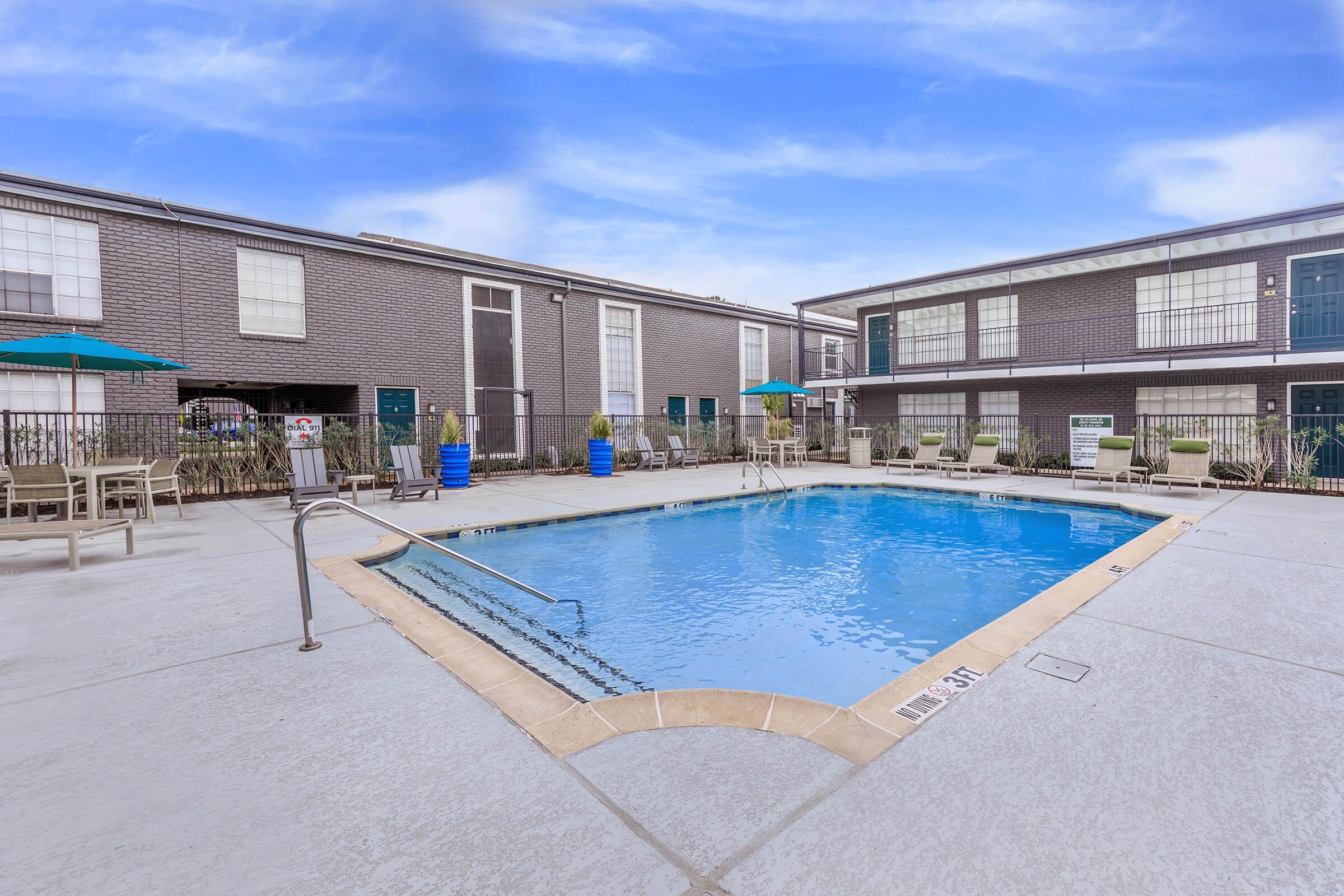 a pool next to a building