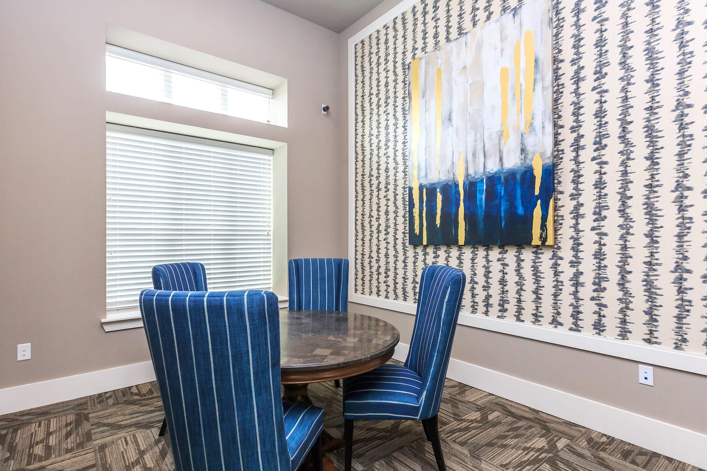 a blue chair in a room