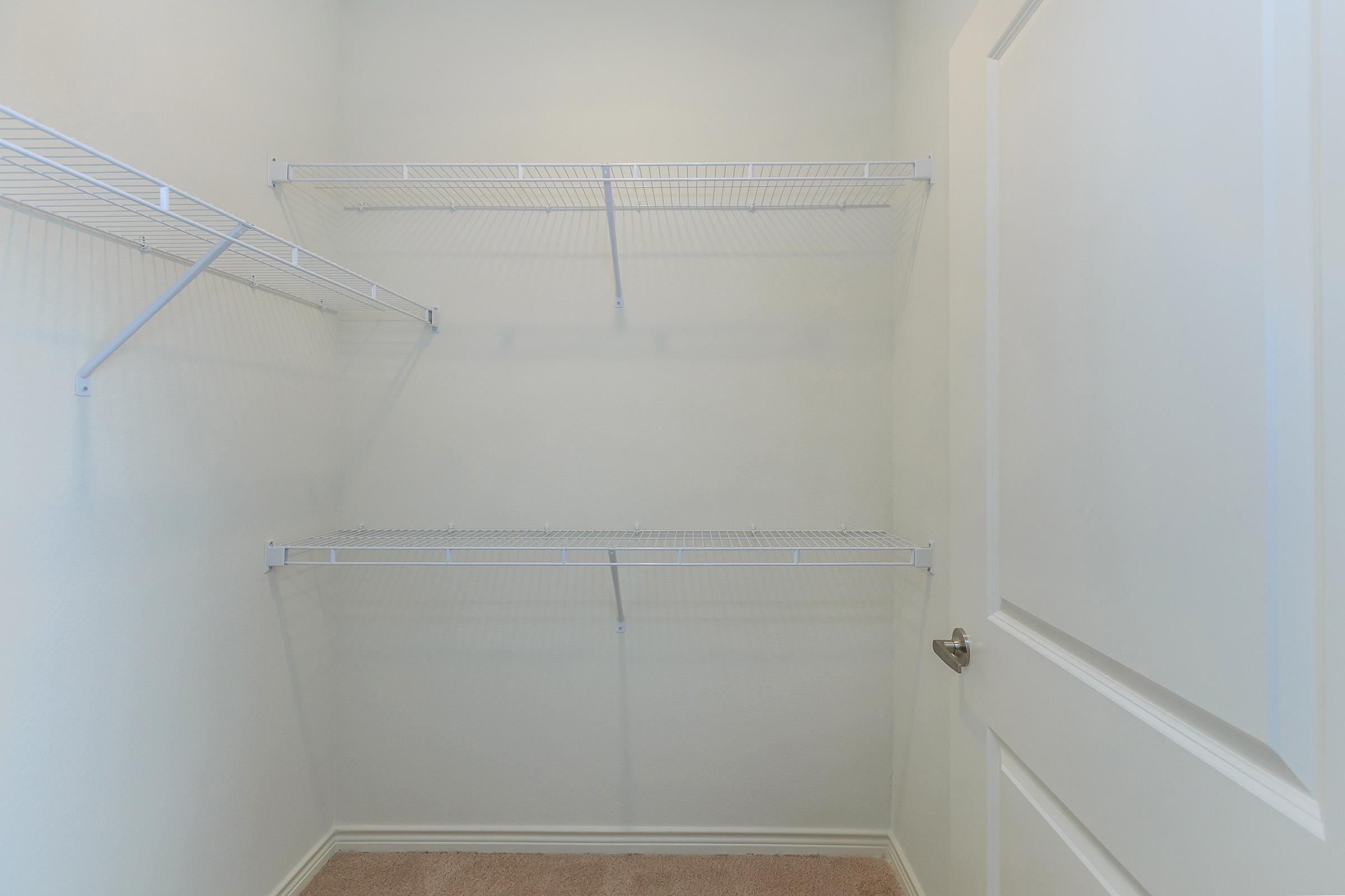 a white tub sitting next to a shower